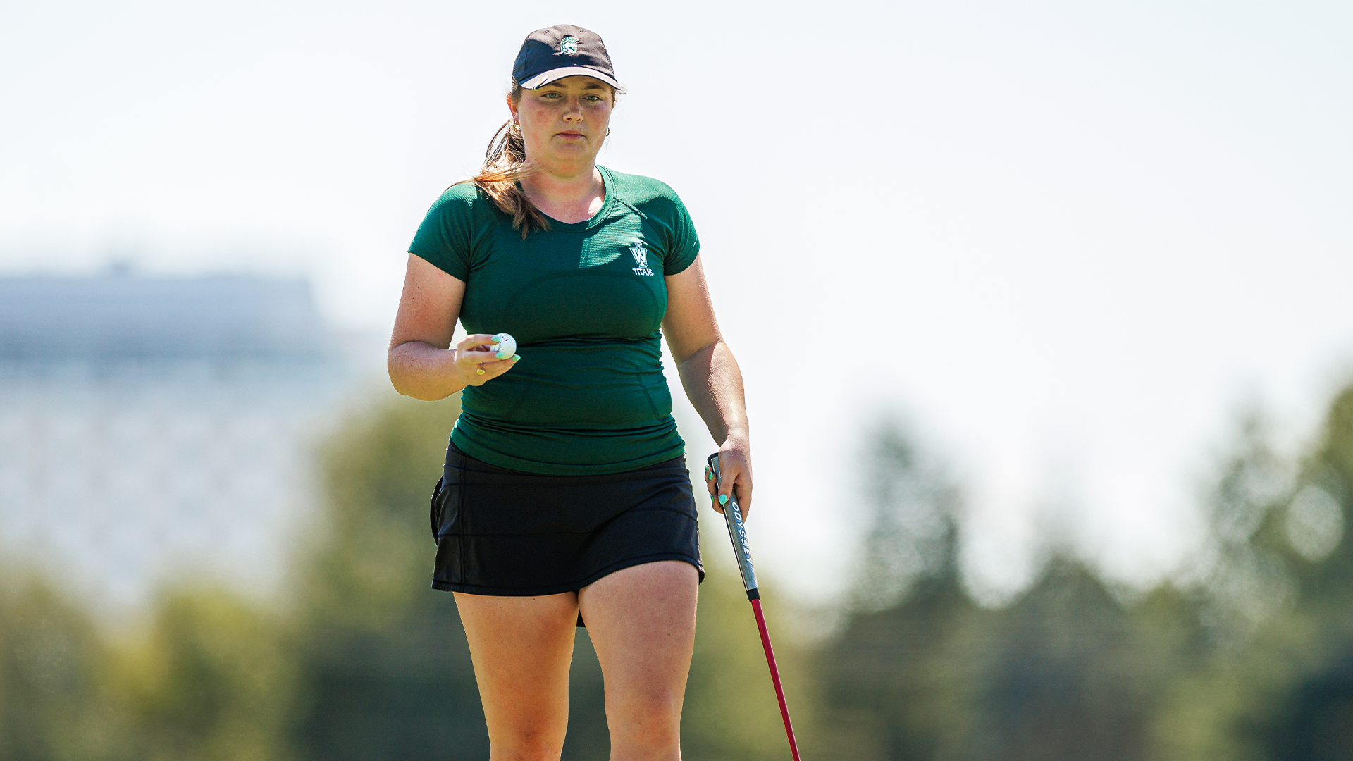 Grace Fagan readies on the green with ball in hand