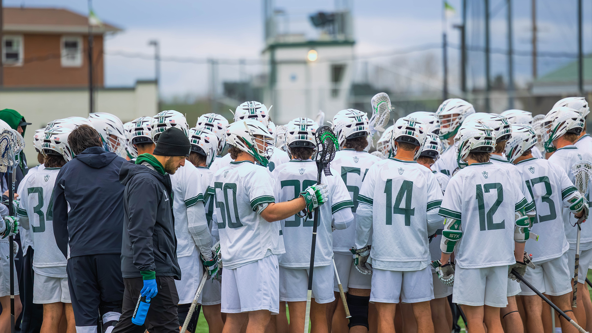 Men's lacrosse huddle against North Central April 4, 2026