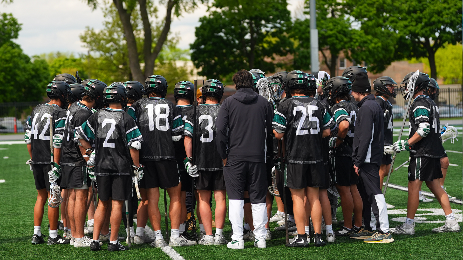 Men's lacrosse huddle at Elmhurst May 2, 2026