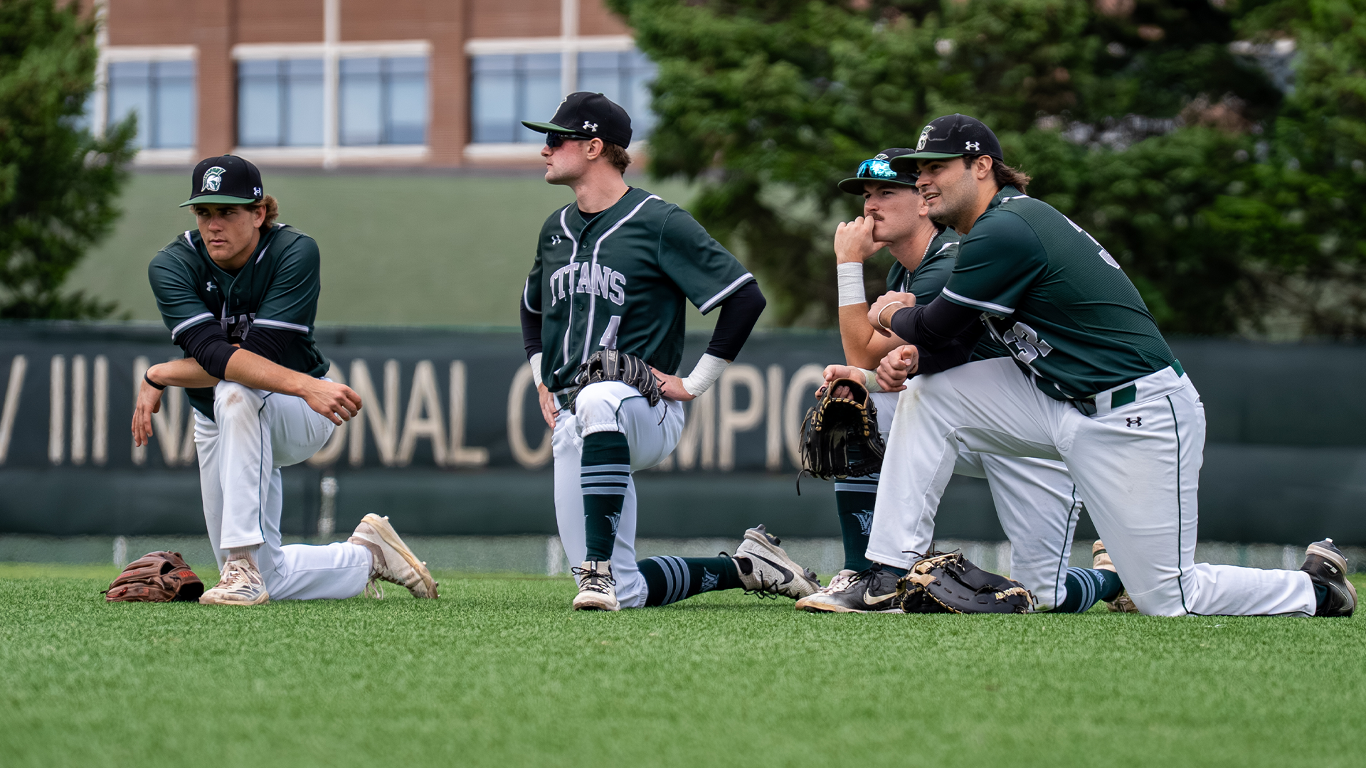 Baseball infield looks upon new pitcher