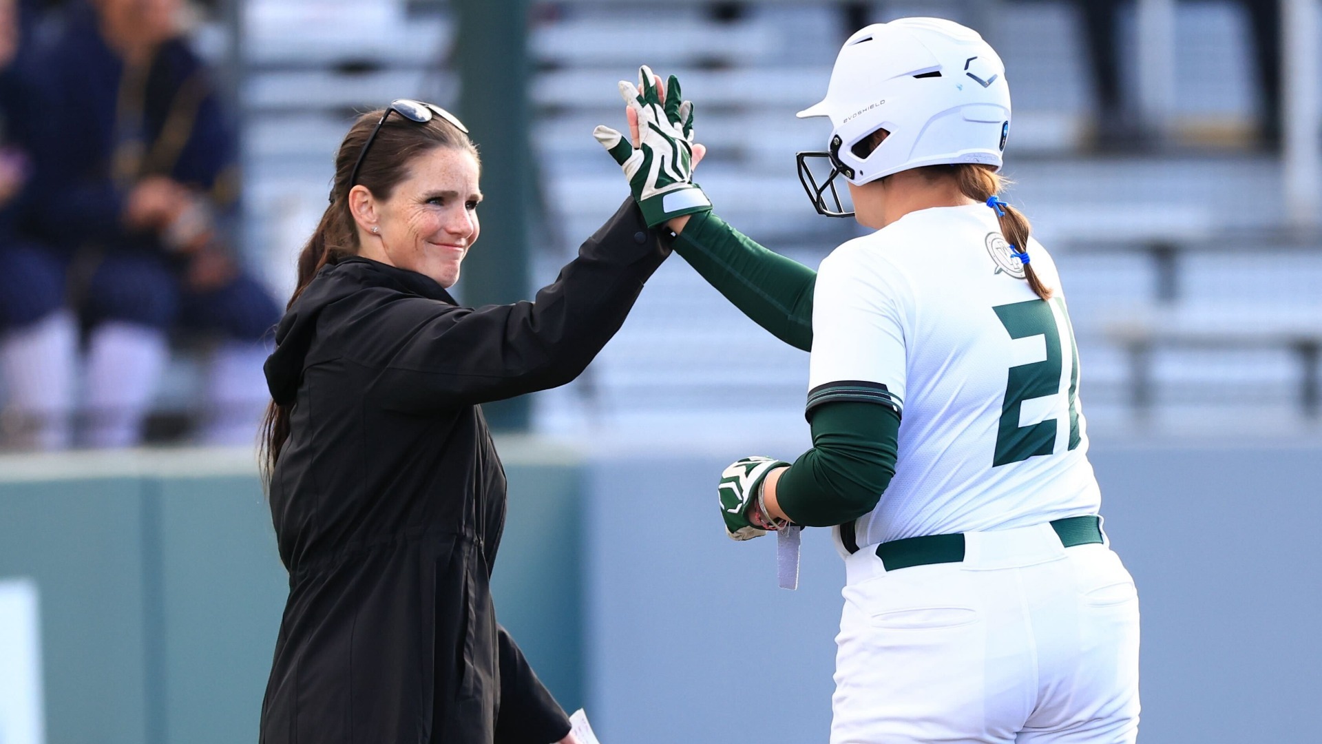 Kimmy Hassel & Jillian Bollard high-fiving