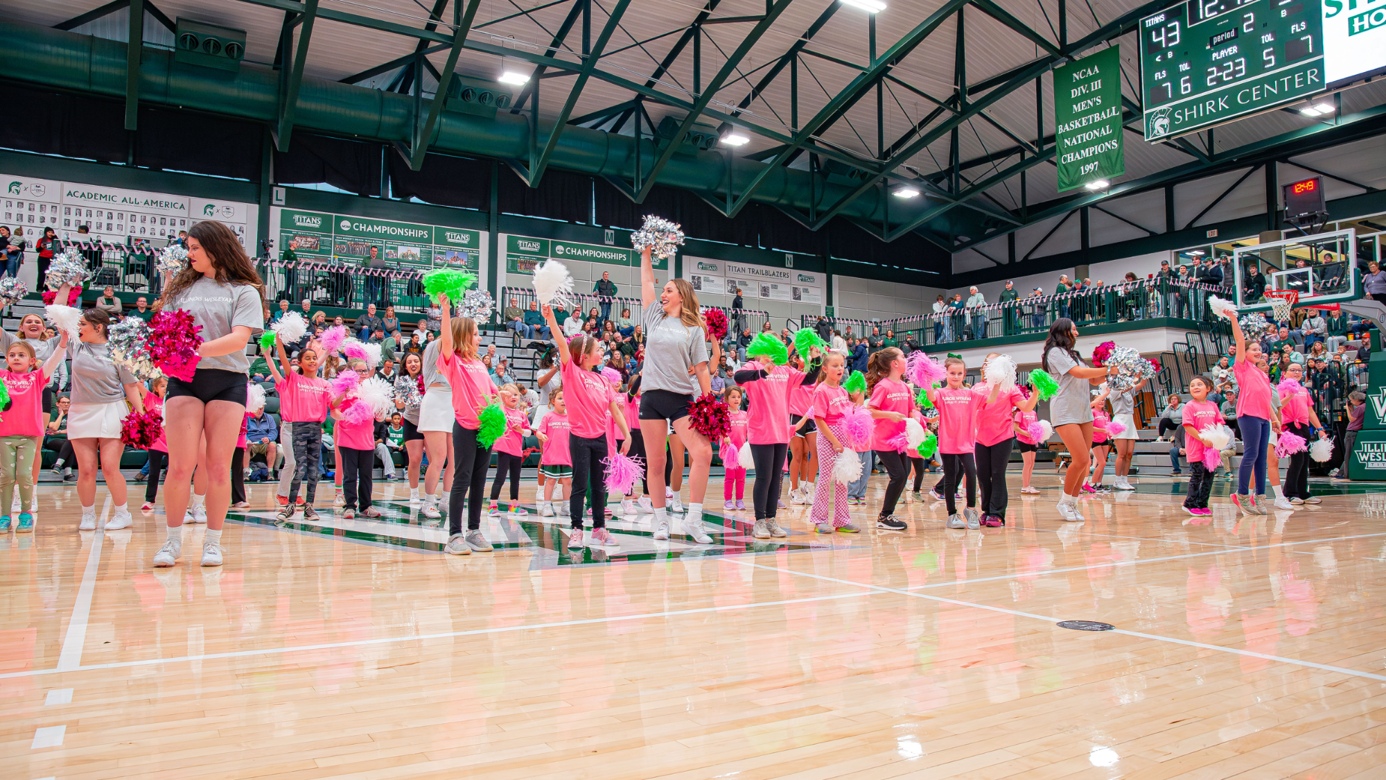 Spirit Squad performing at pink out game vs North Central College in January 2026