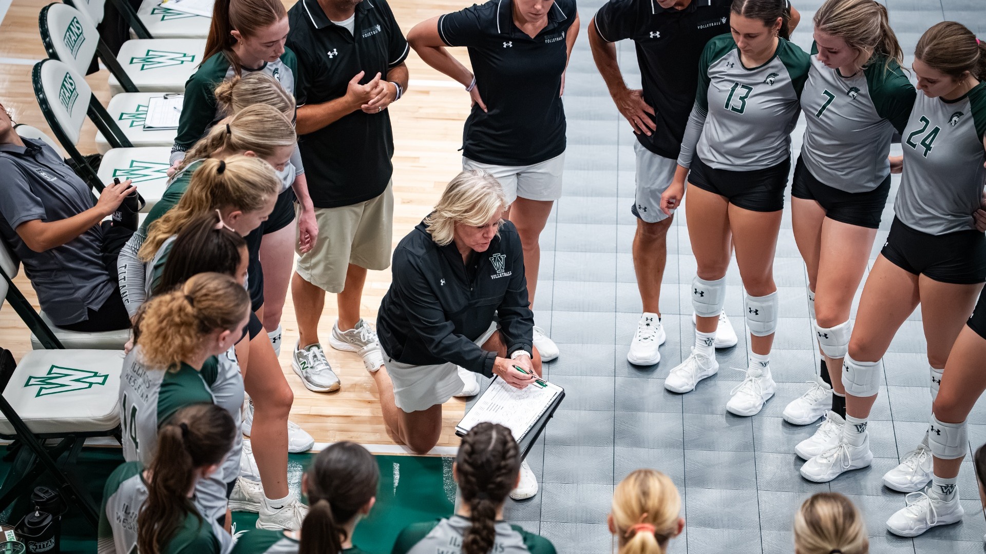 Team huddle of womens volleyball