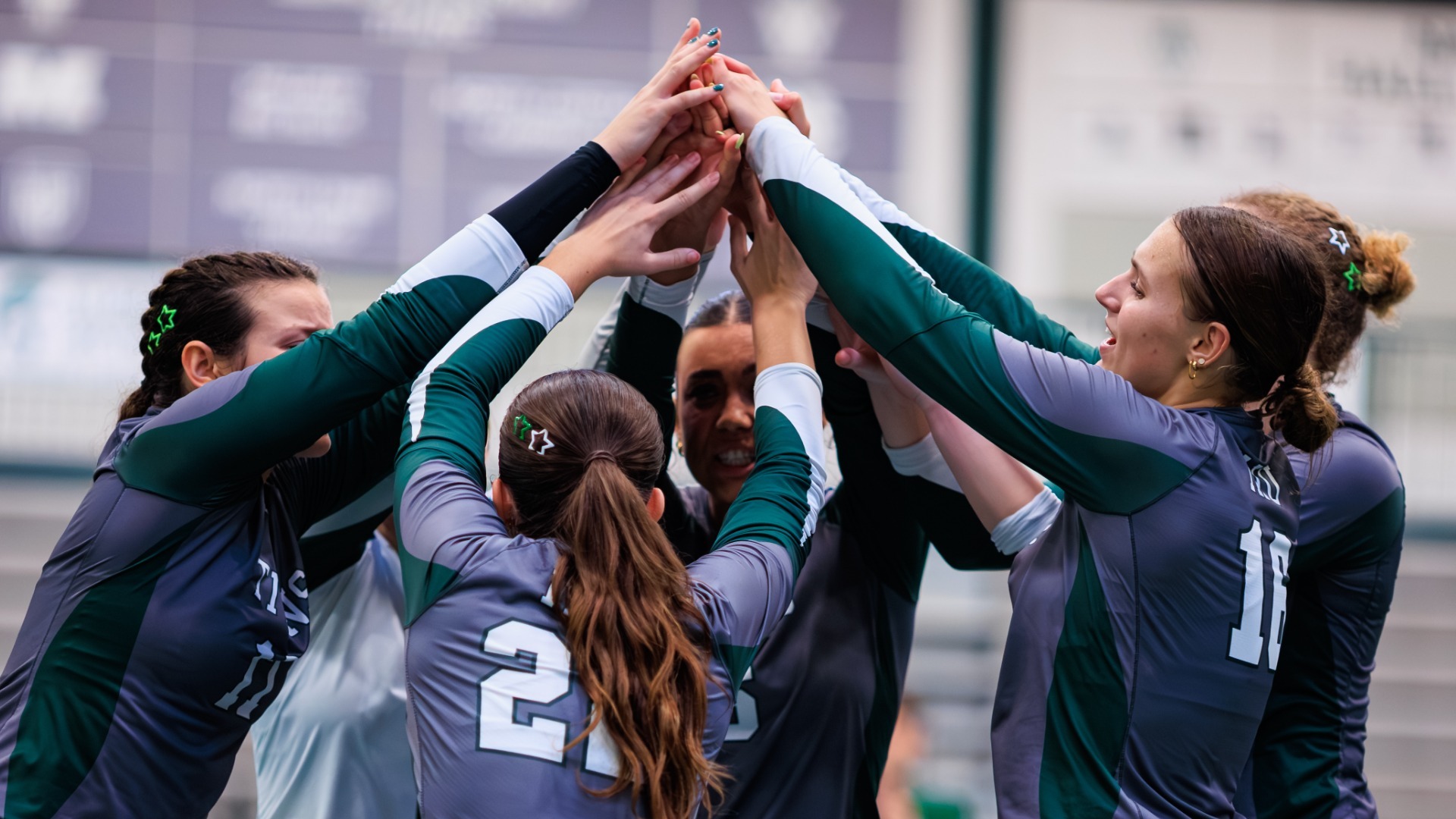 Team huddle hands up