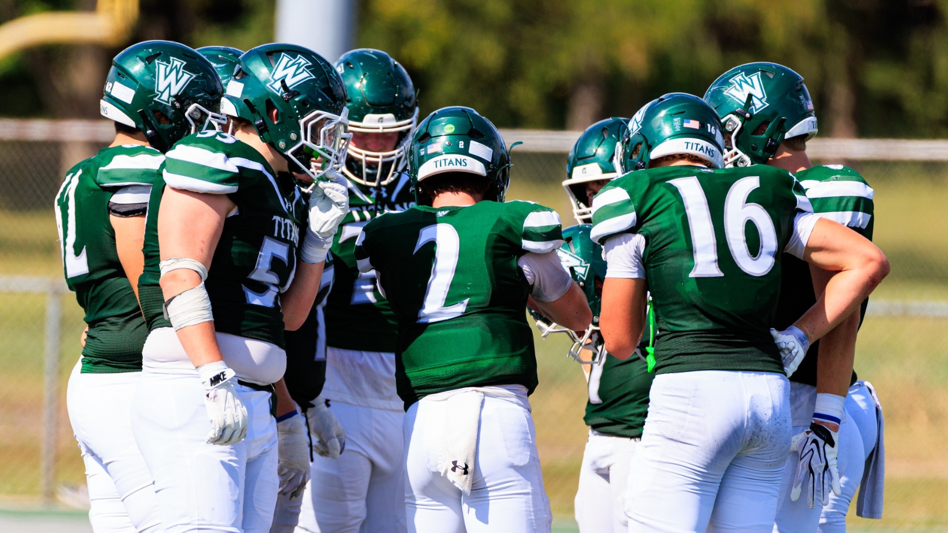 Titan football offensive huddle