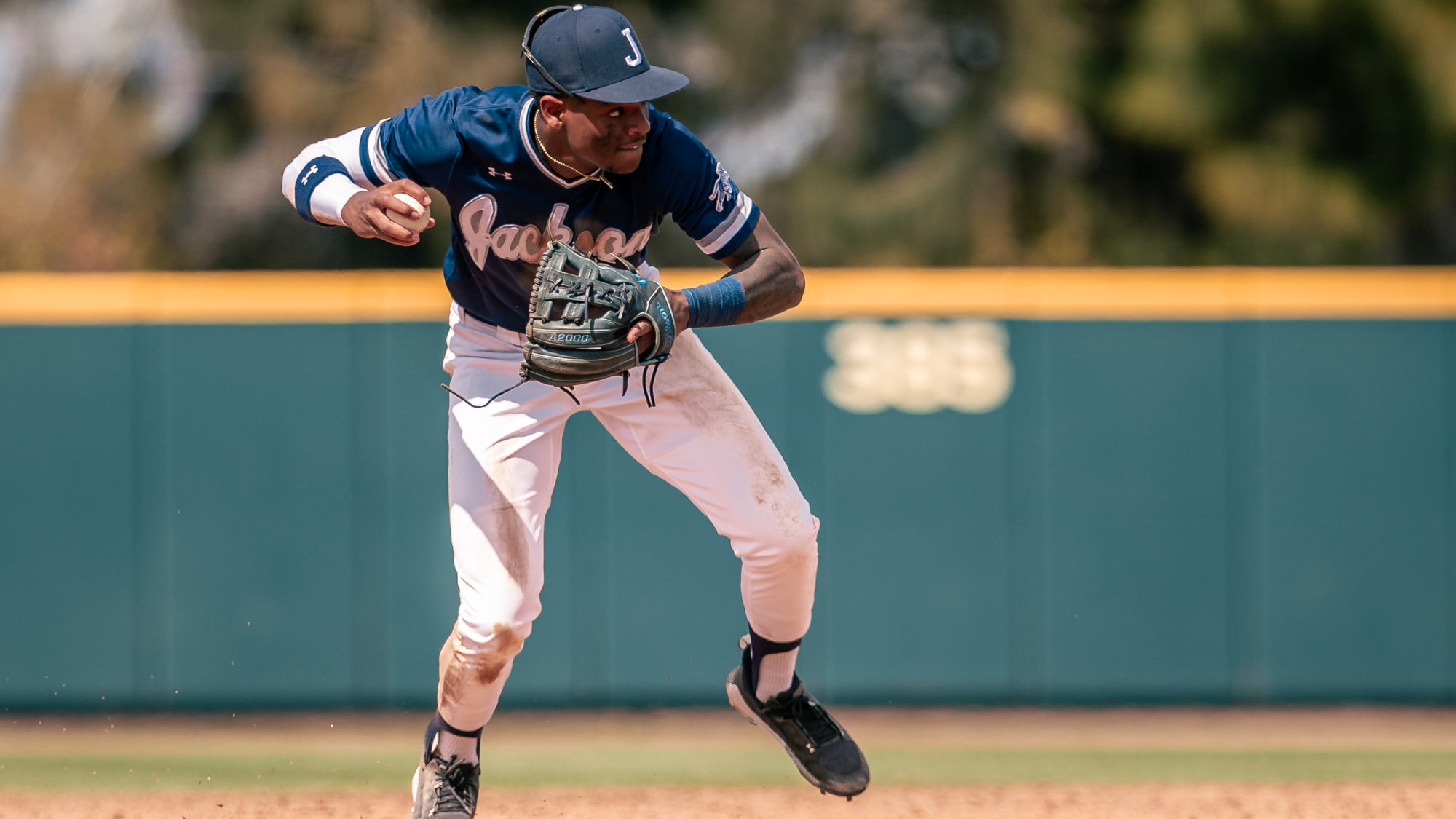 Robert Tate Jr. fields and throws on the road early in the season