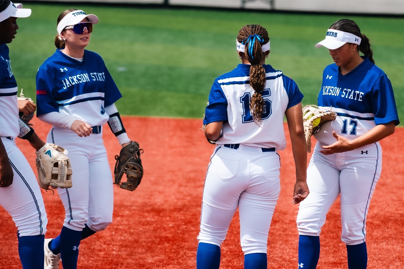 JSU softball-infielders in game one of the SWAC Tournament in royal blue and white jerseys 