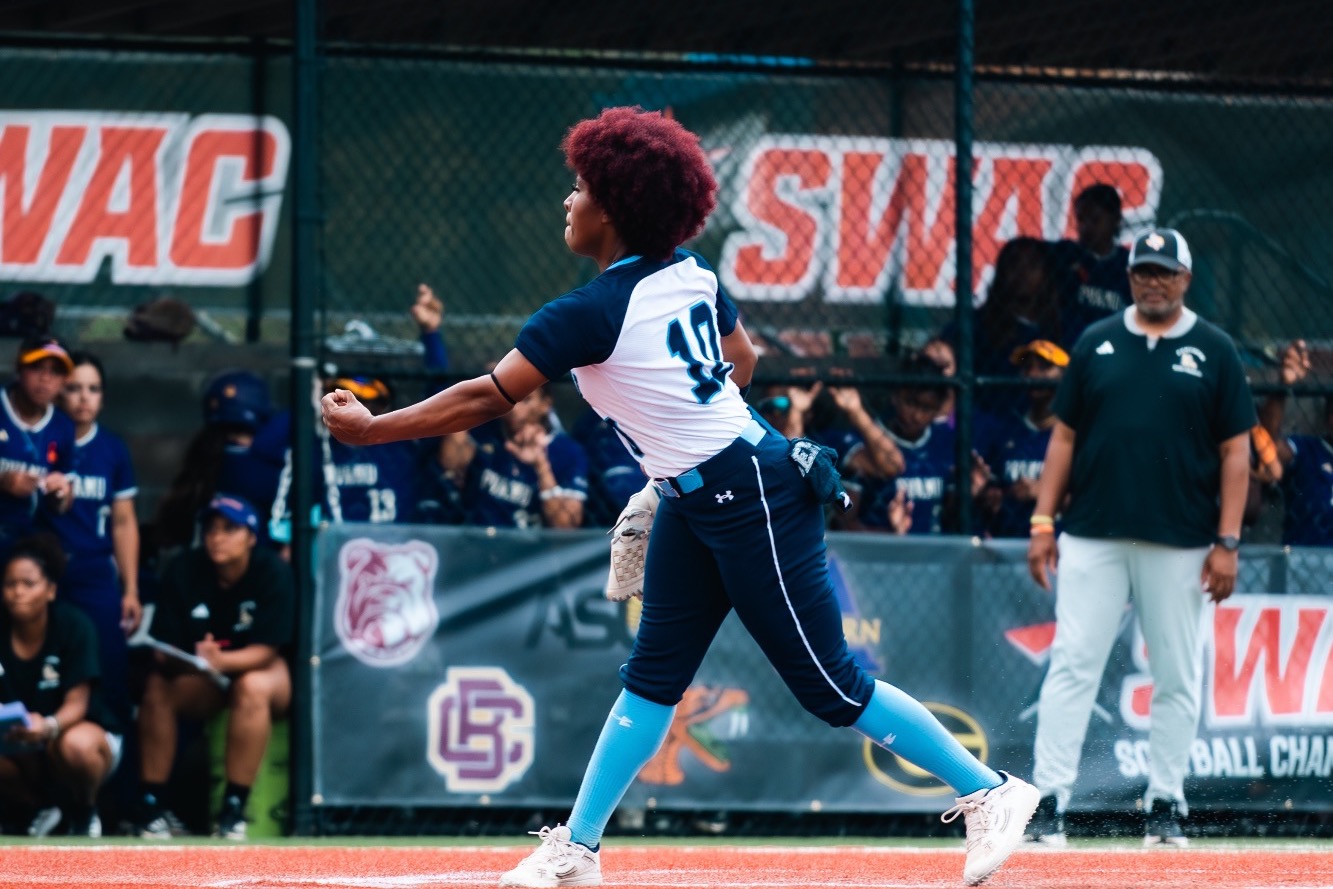  Brooklyn Morris pitching at SWAC Tournament in white and blue jersey and navy pants
