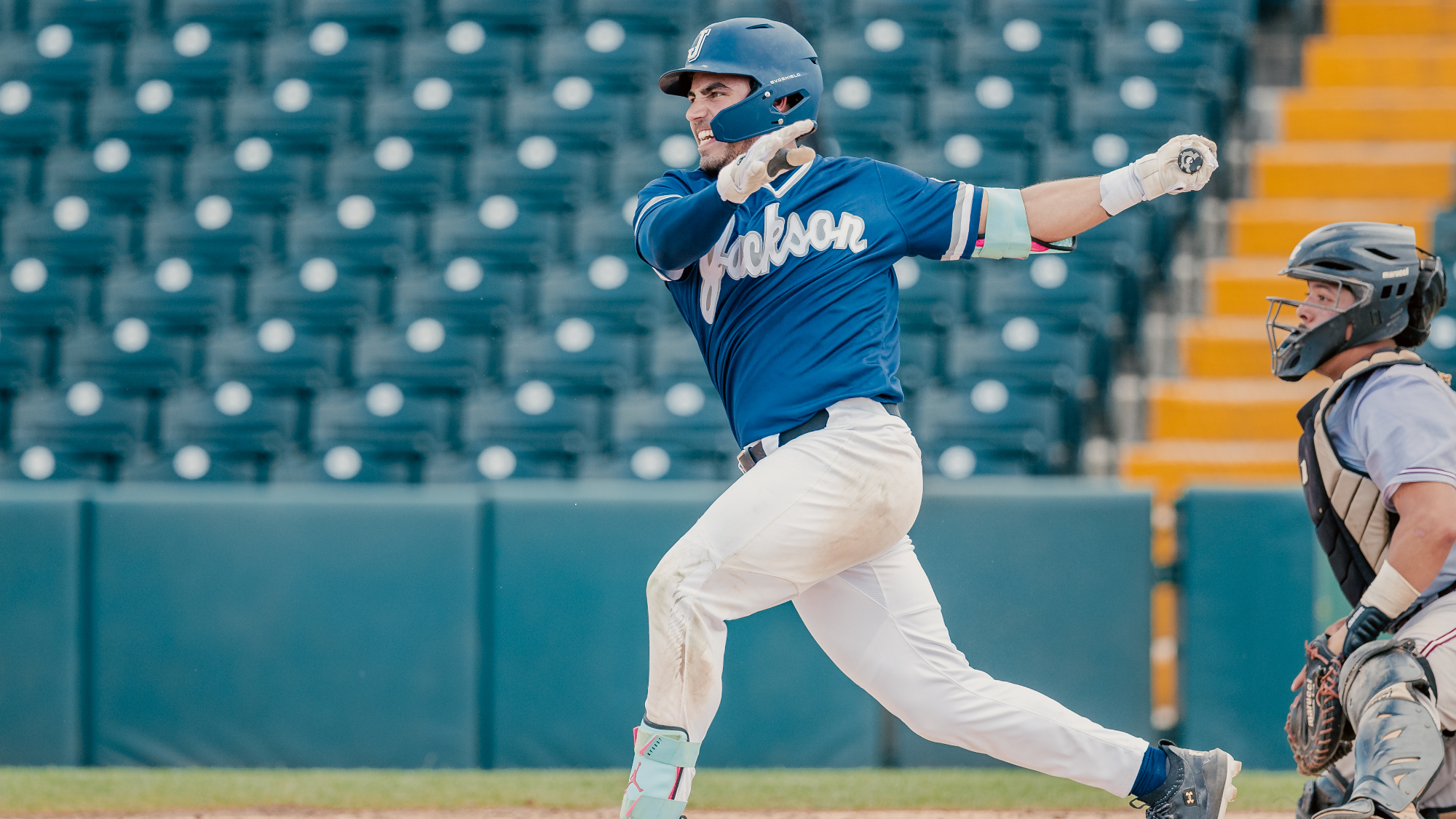 Pierre Cabral swings at a pitch at the Andre Dawson Classic