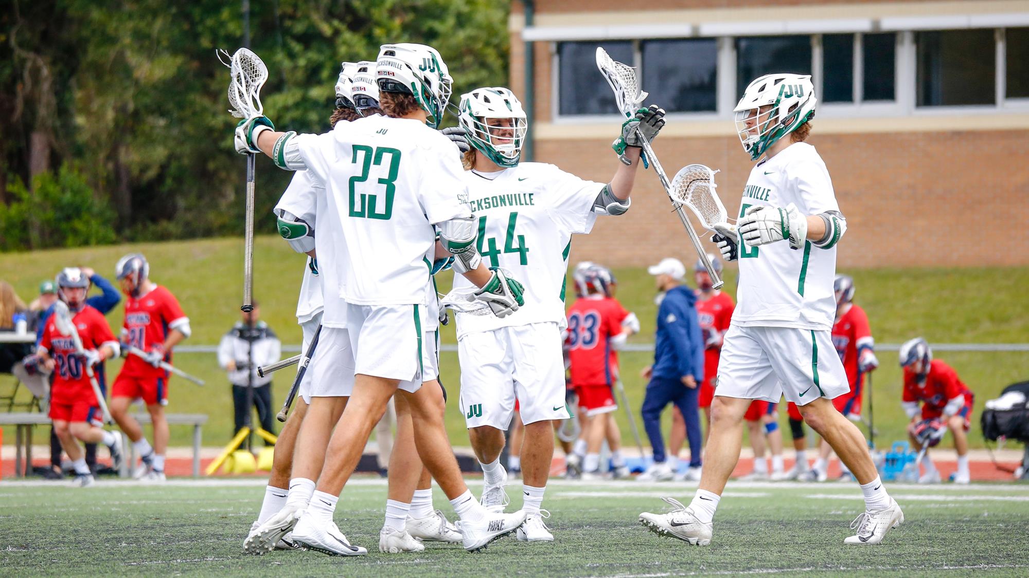 Dolan, Tyler Help Power Dolphins Past RMU at Tierney Field