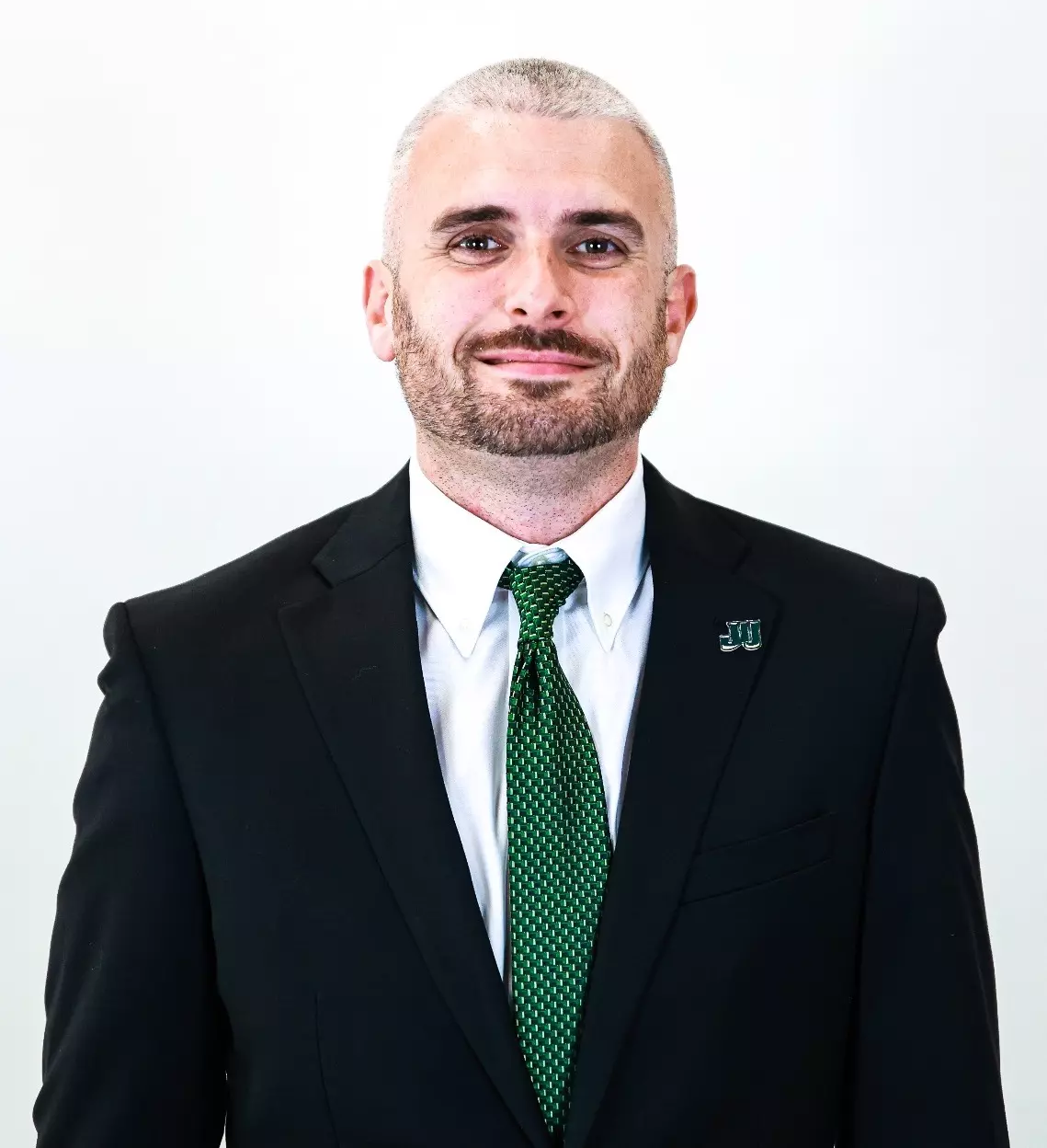 Brett Comer updated headshot summer 2025