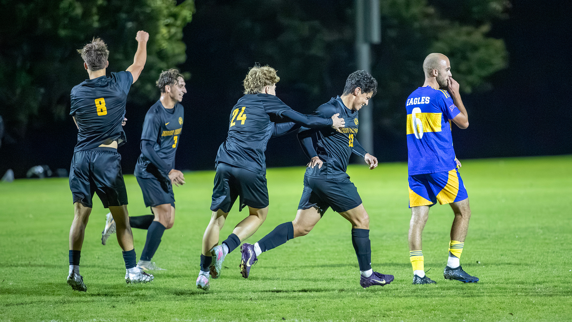 team-celebrate-southwestern-christian-mens-soccer-2025