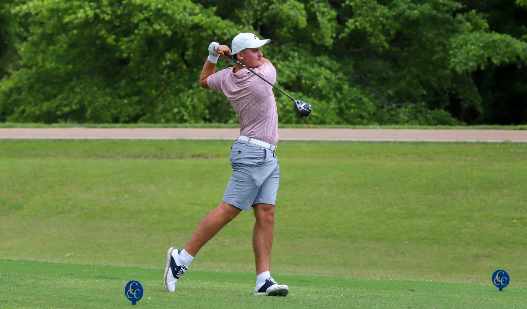 josh tombs hitting a golf ball