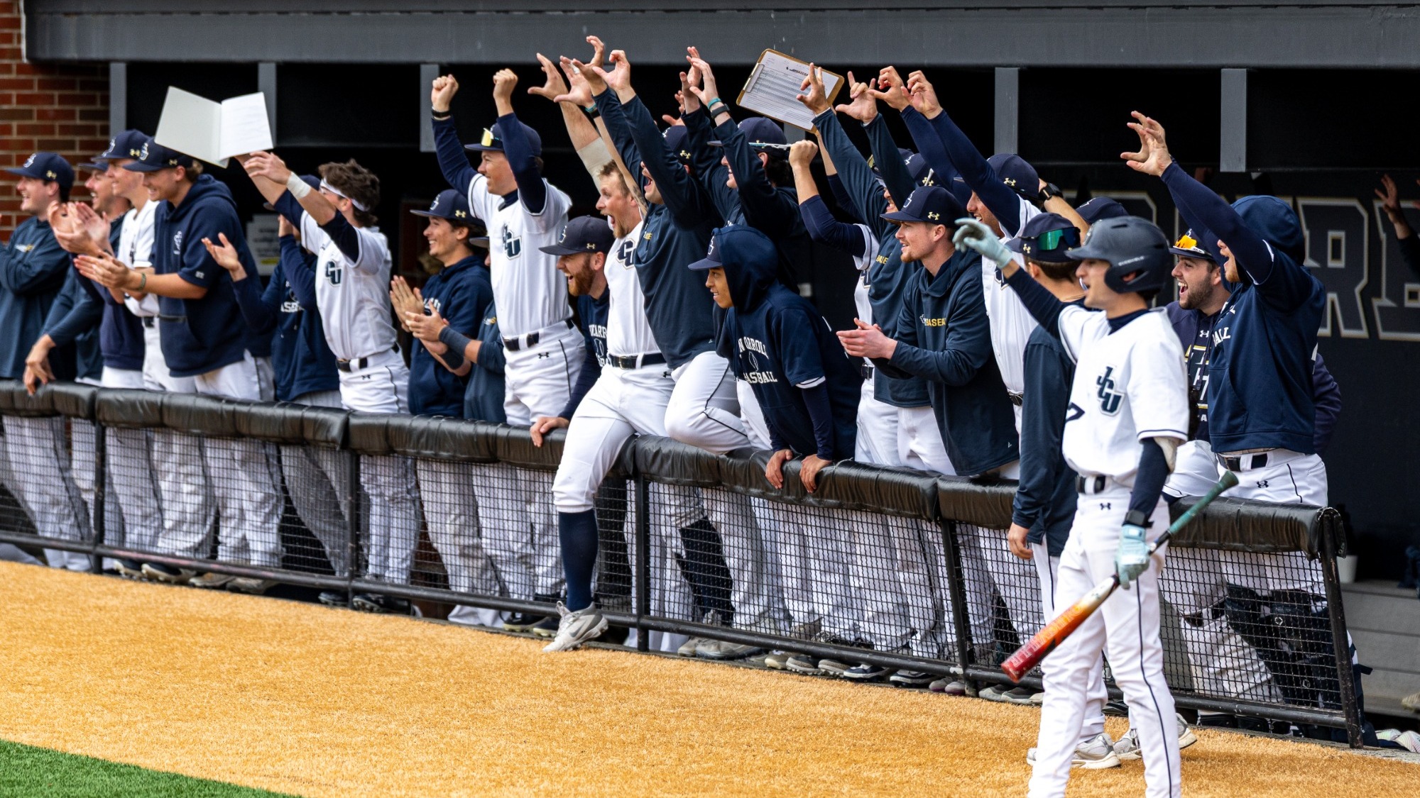 Baseball team celebration photo vs. Thiel