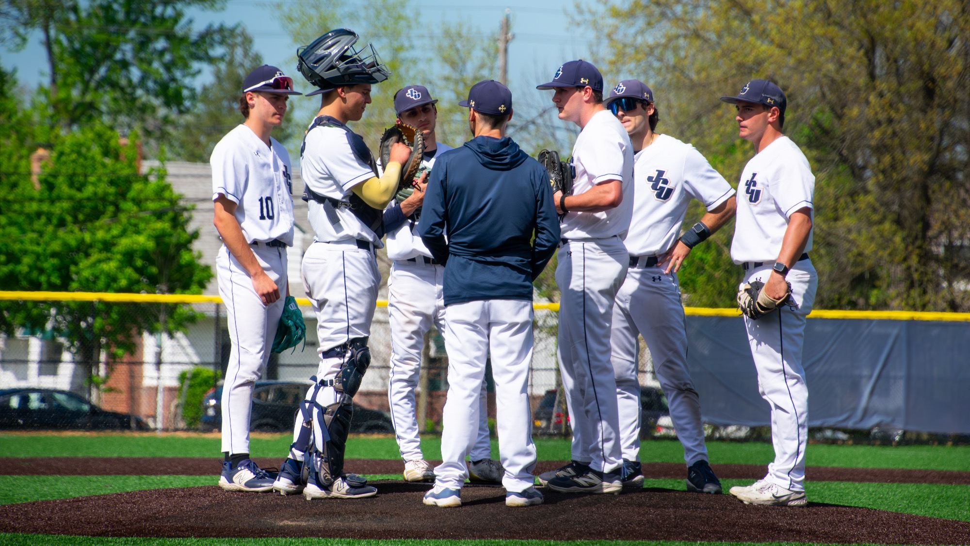 Bobby Bell talking with pitching staff