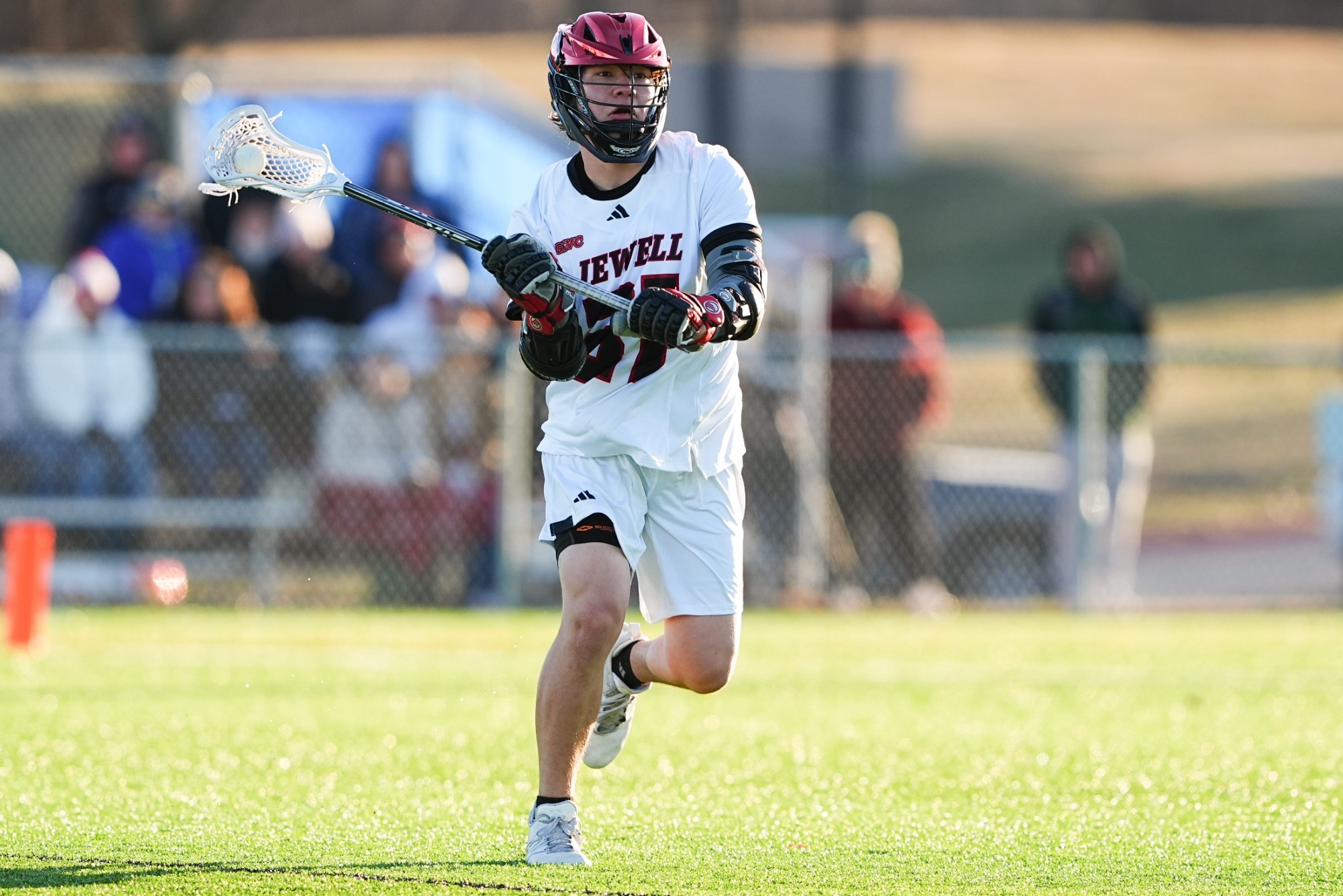 Kade Barvitz running with ball in stick