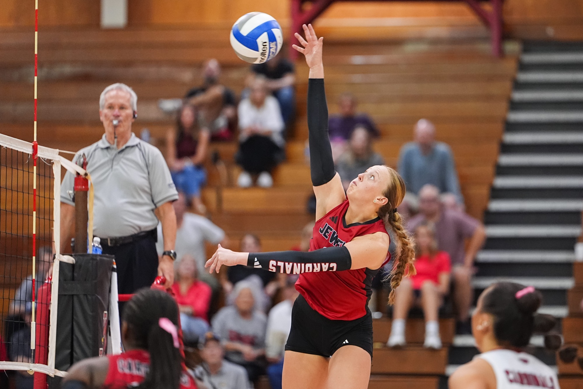 Kelsey Keling hitting a volleyball