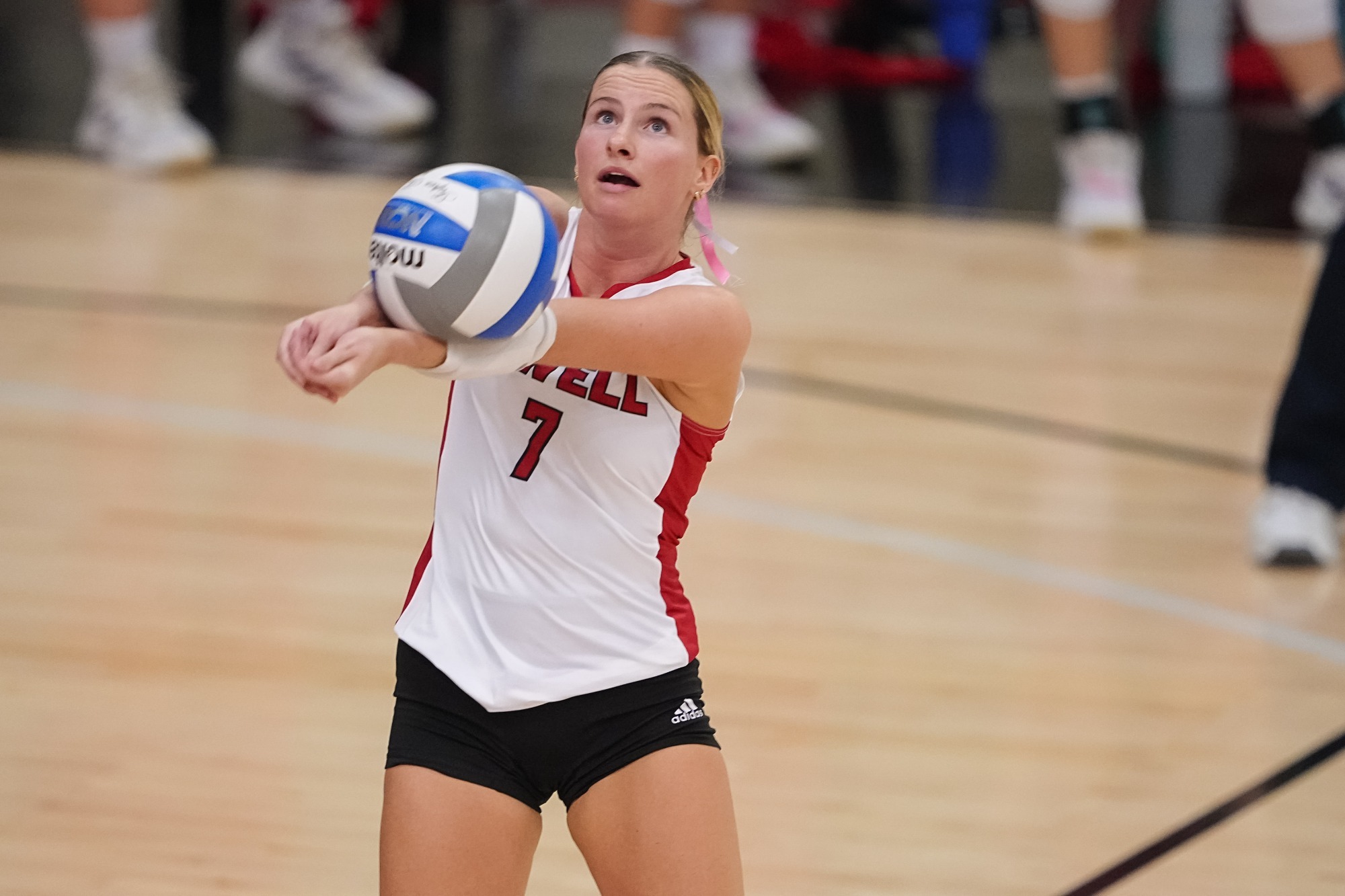 Brianna Witthar passing volleyball