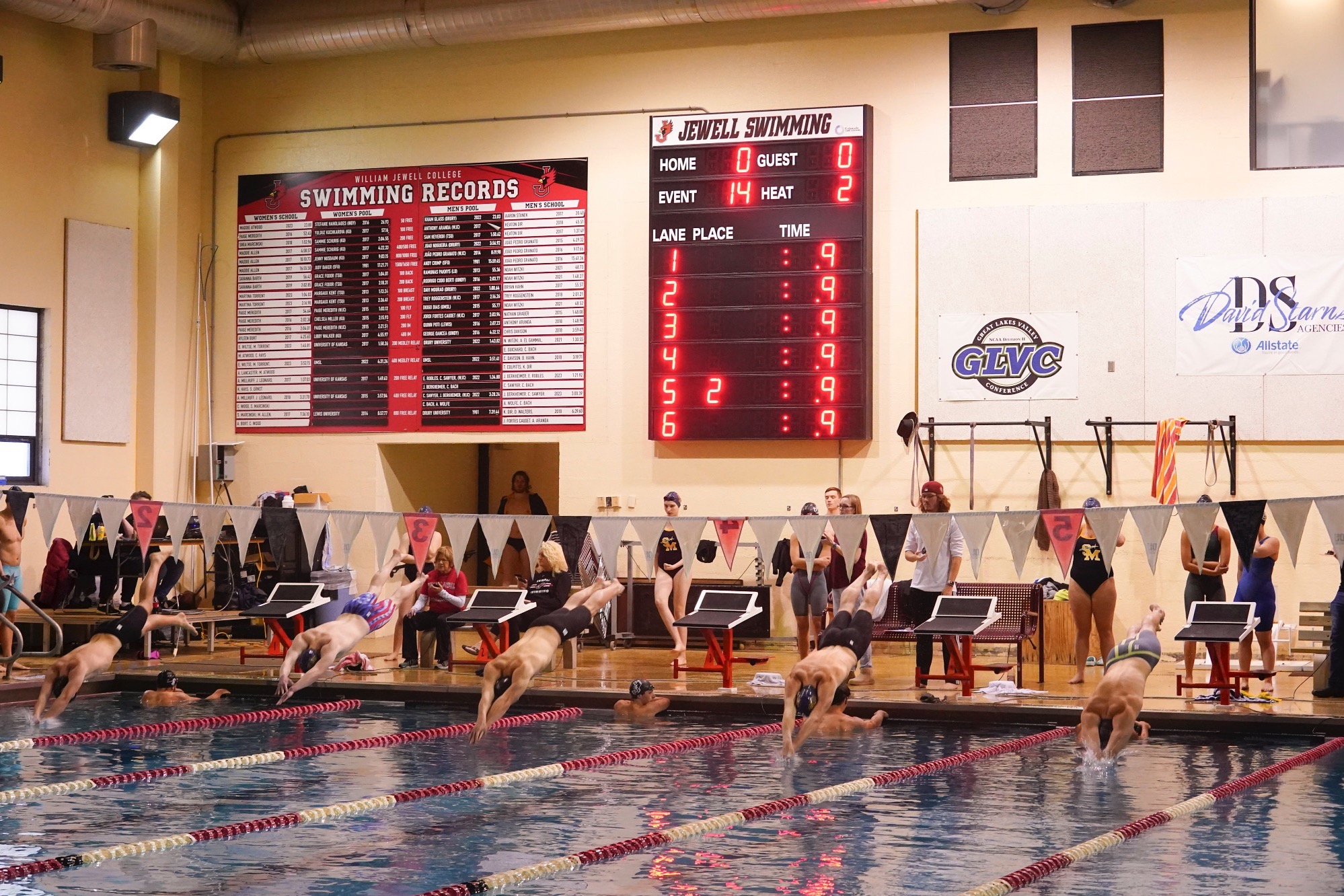 Swimmers Jumping In Pool