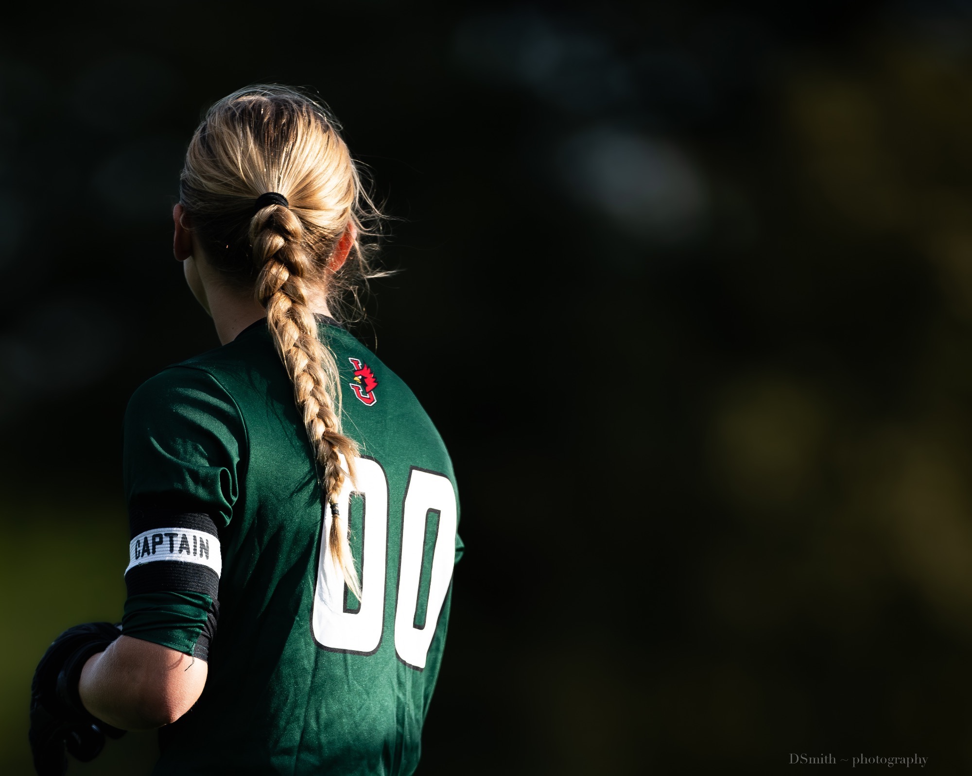  00 green jersey with blonde hair braids