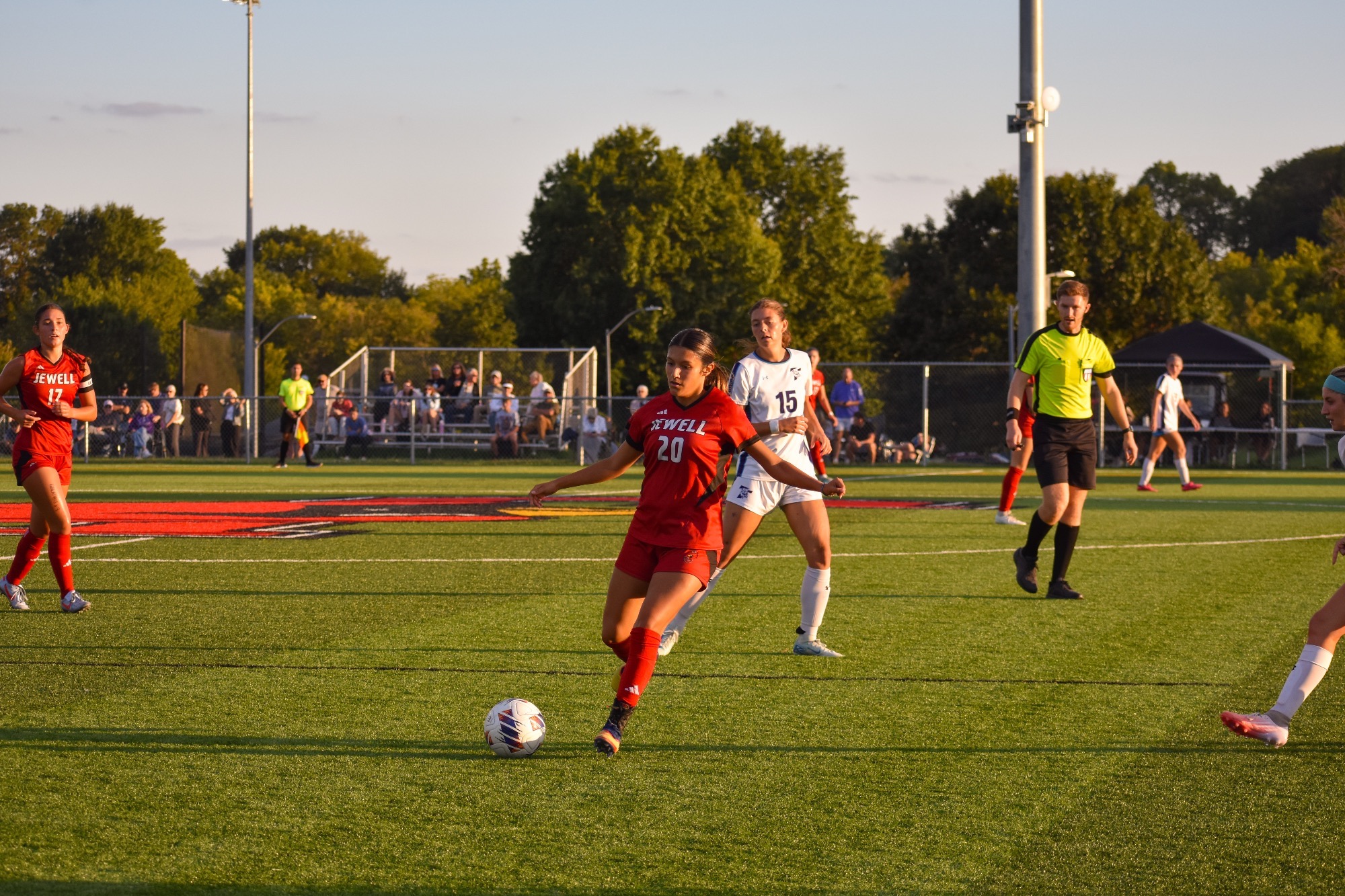 Jessica Peterson kicks ball