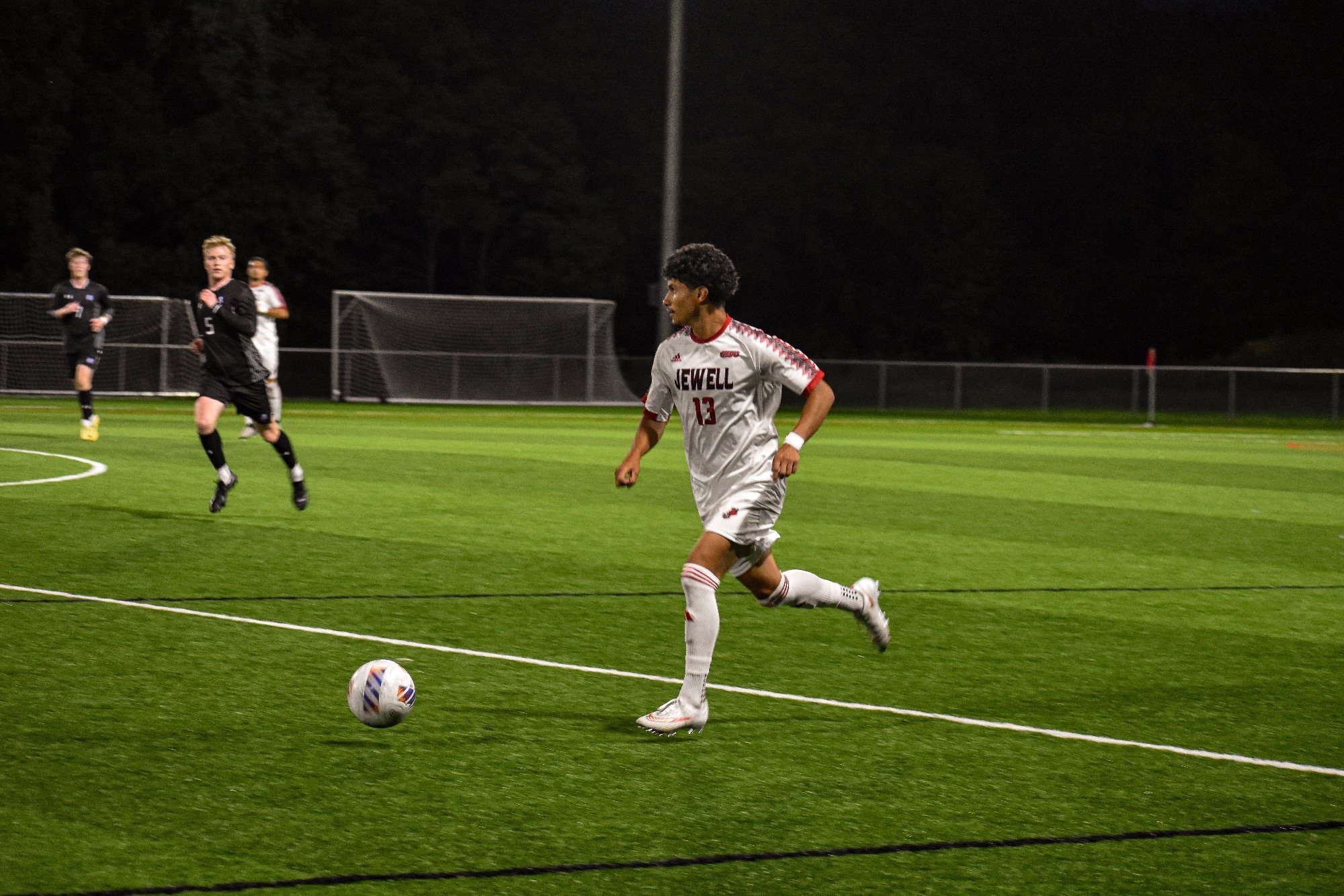 David Hernandez kicks ball