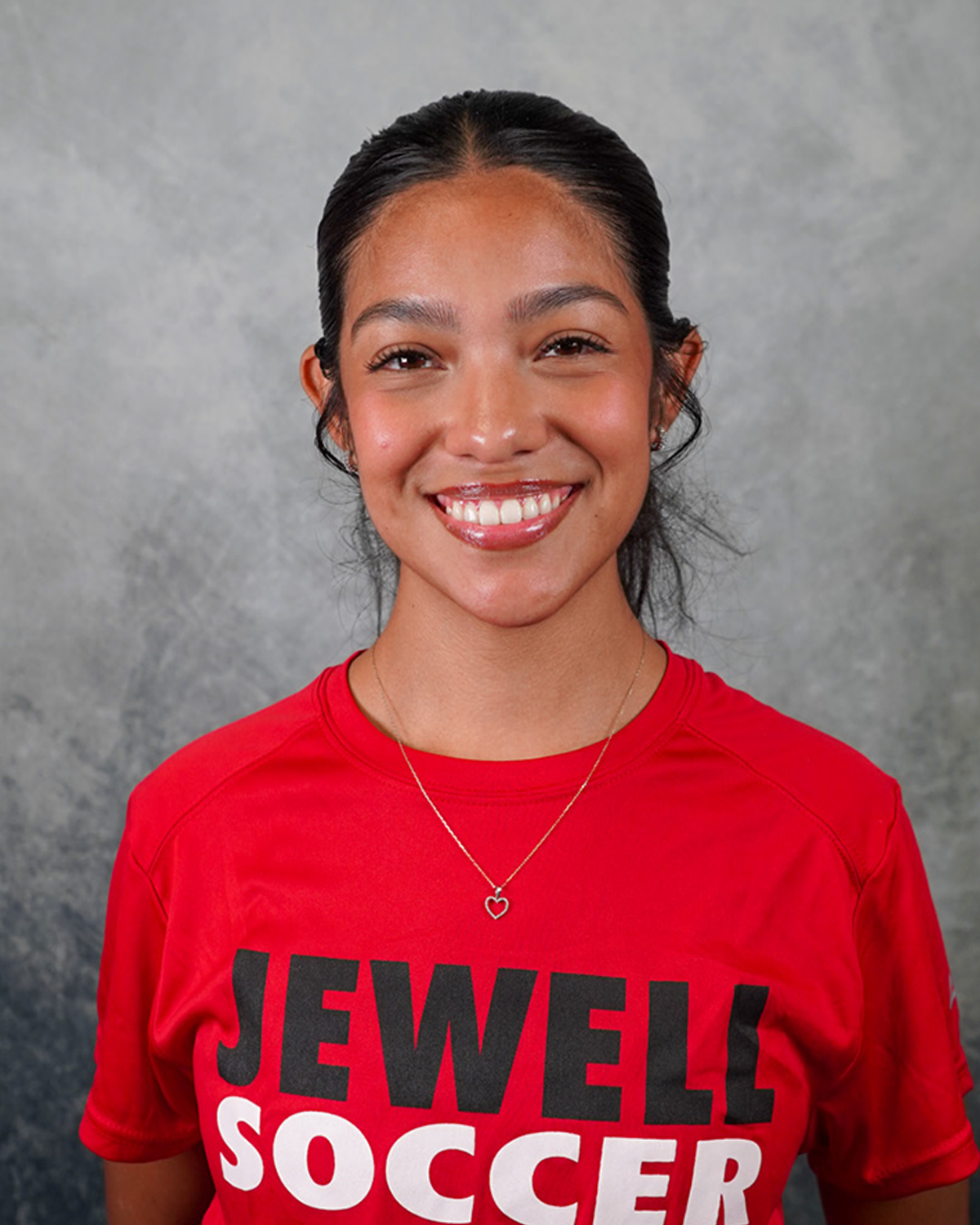 Aimee Nunez assistant coach wearing a red Jewell Soccer tshirt