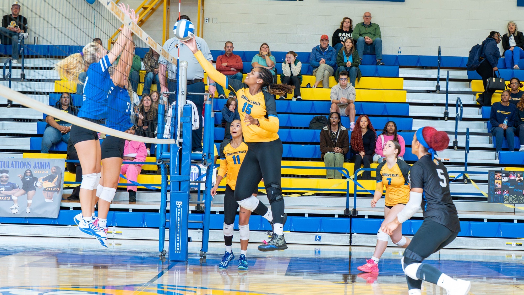 woman hitting a volleyball