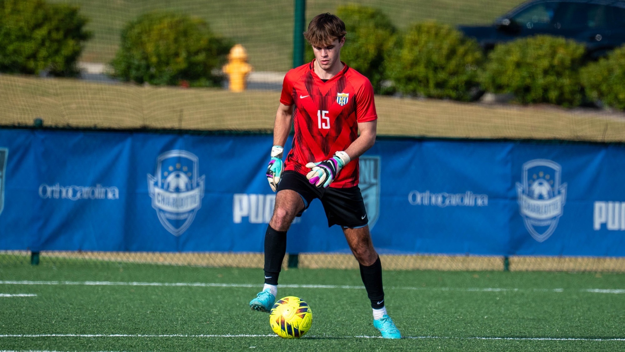 man dribbling a soccer ball