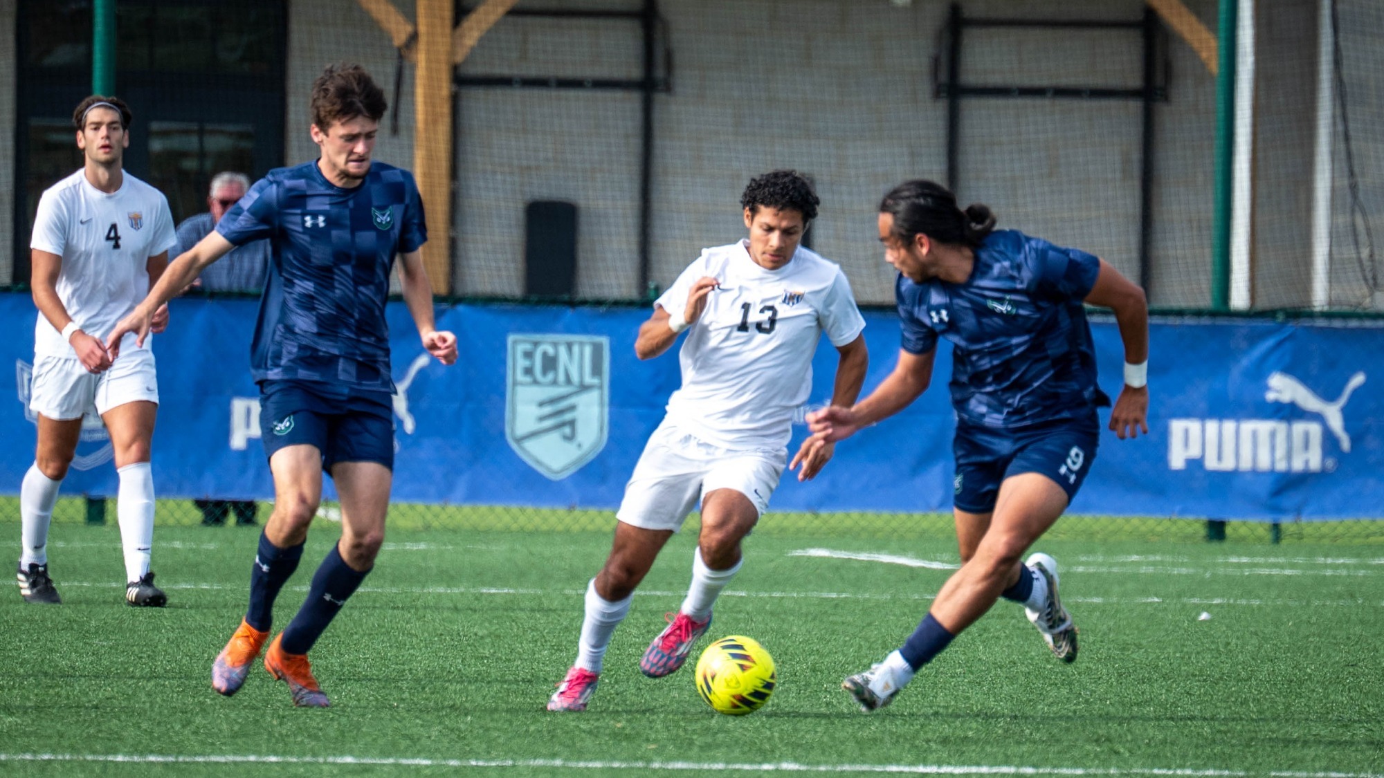 man dribbling a soccer ball