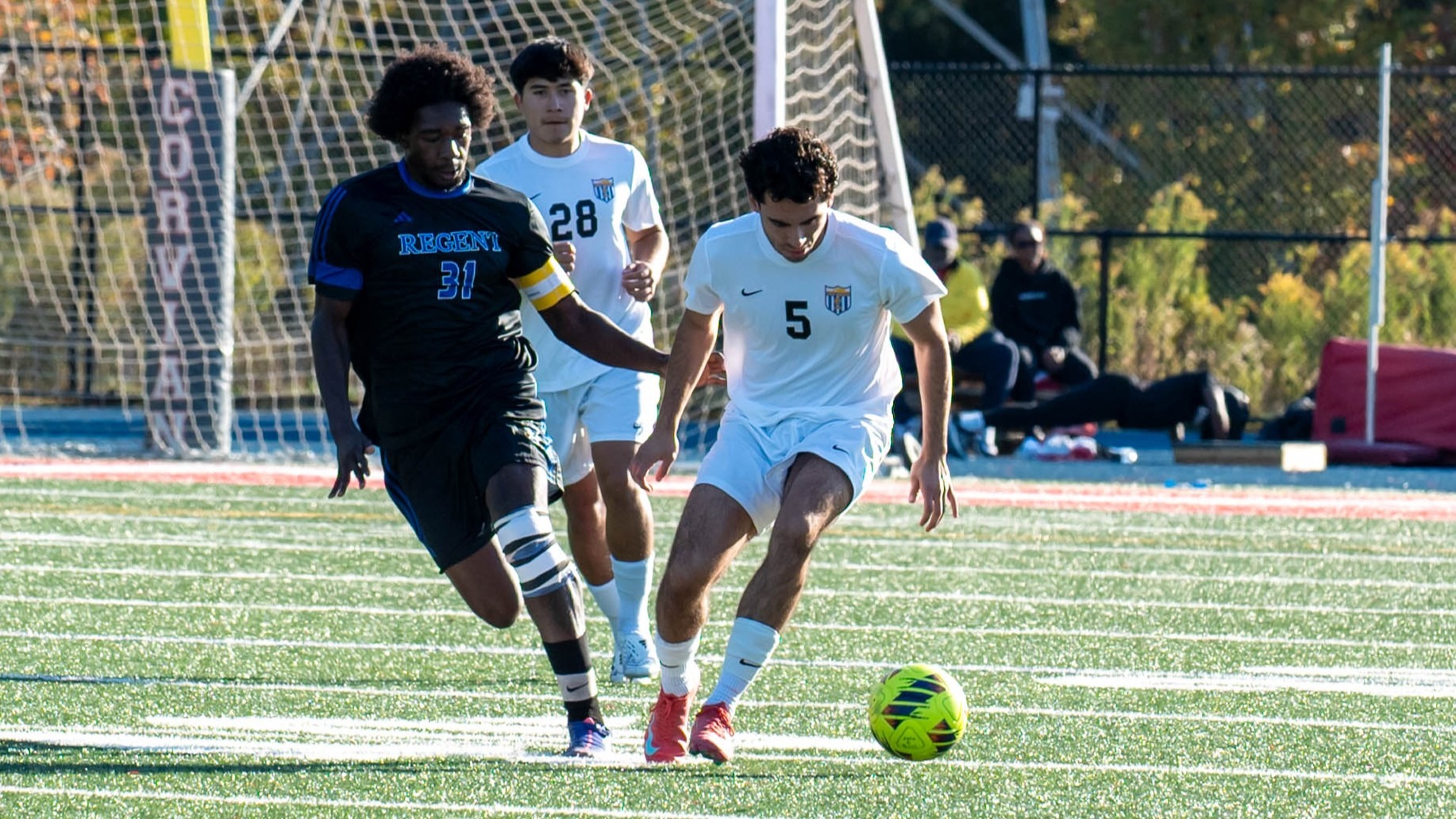 man dribbling a soccer ball