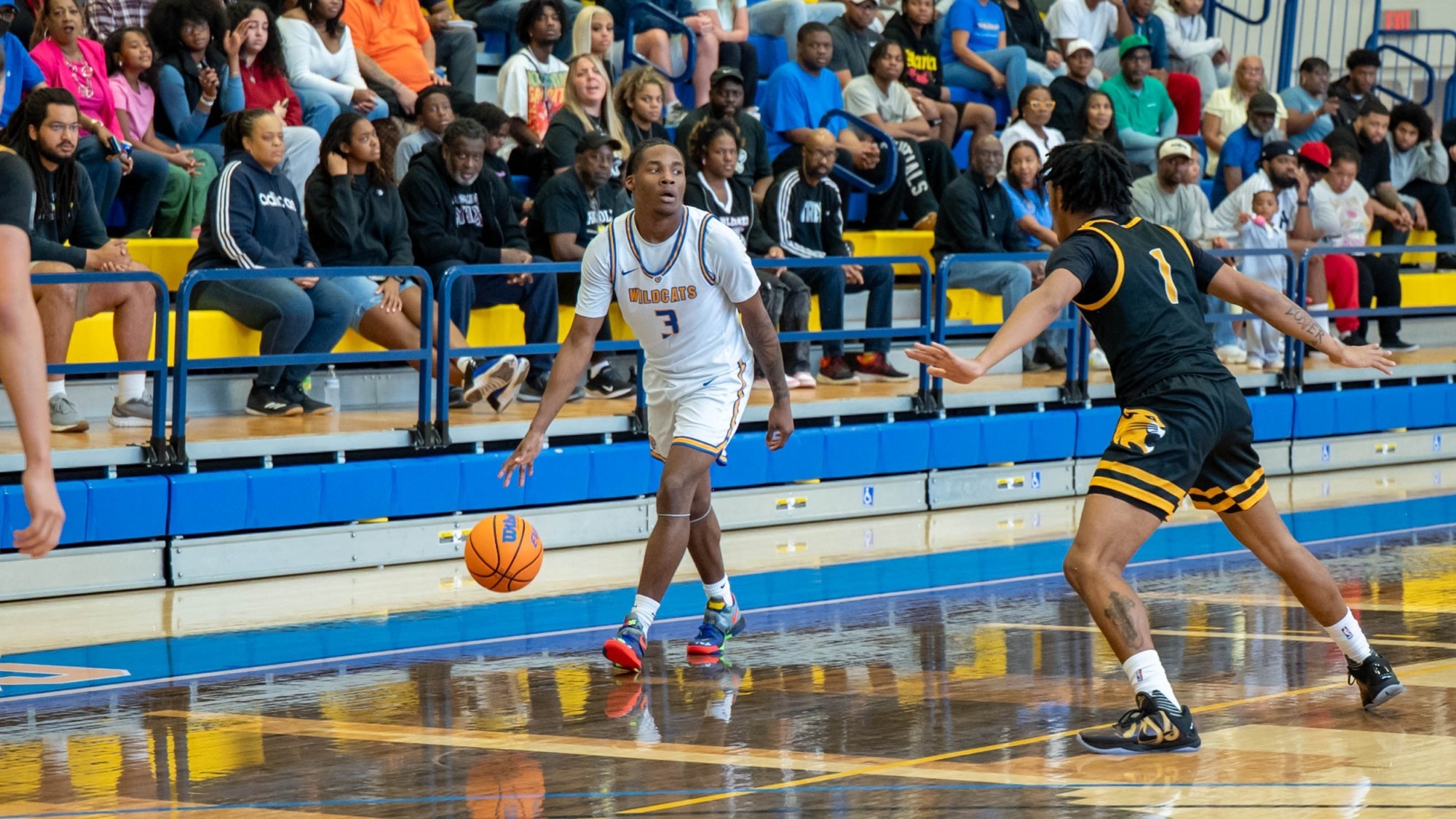 man dribbling a basketball