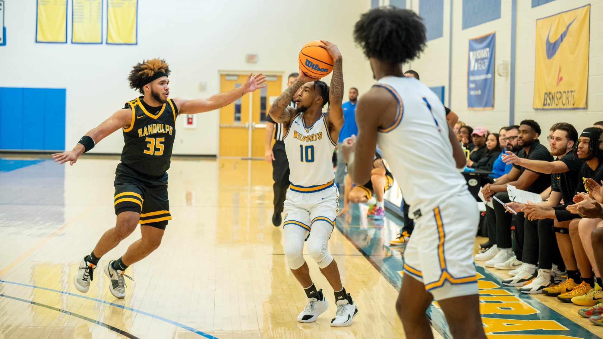 man shooting a basketball