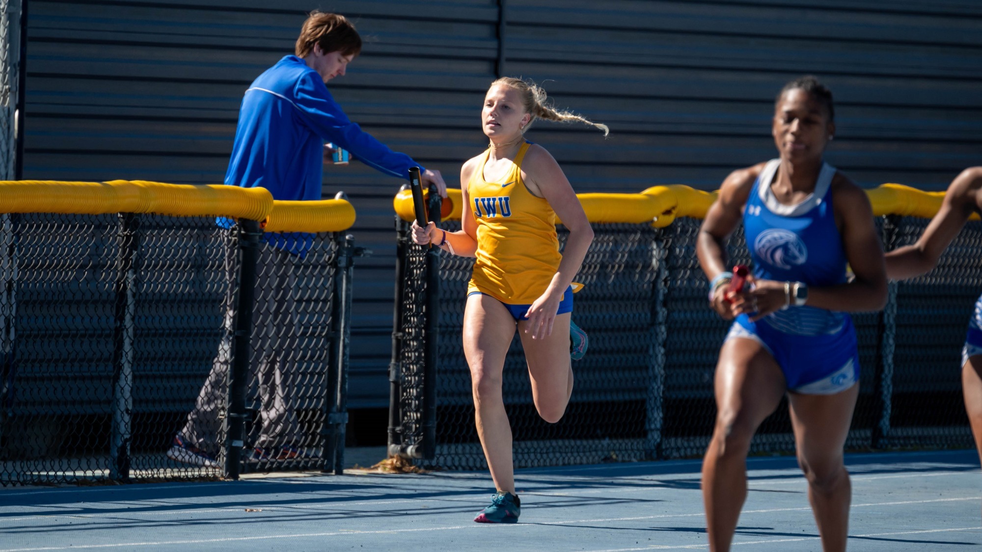 woman running on a track
