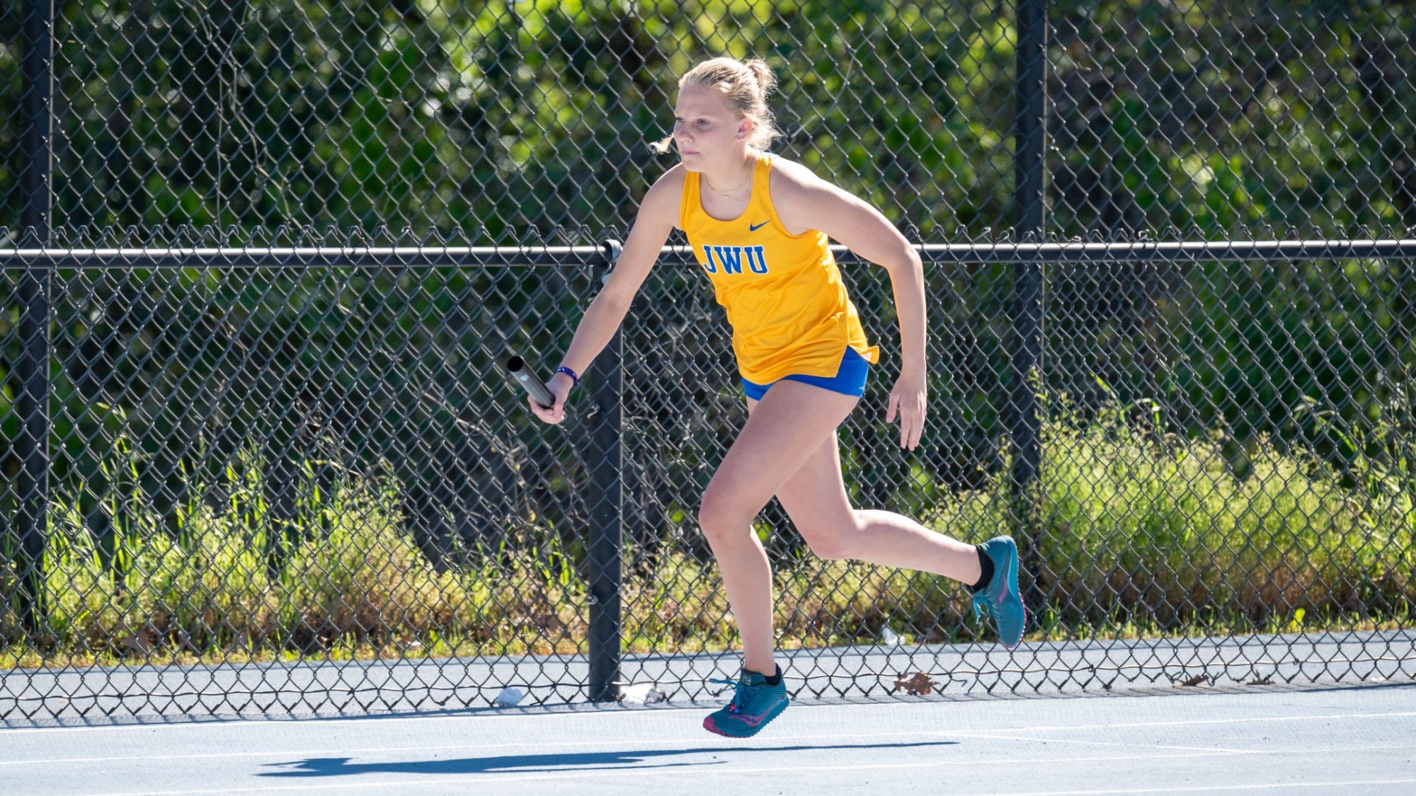 woman running on a track