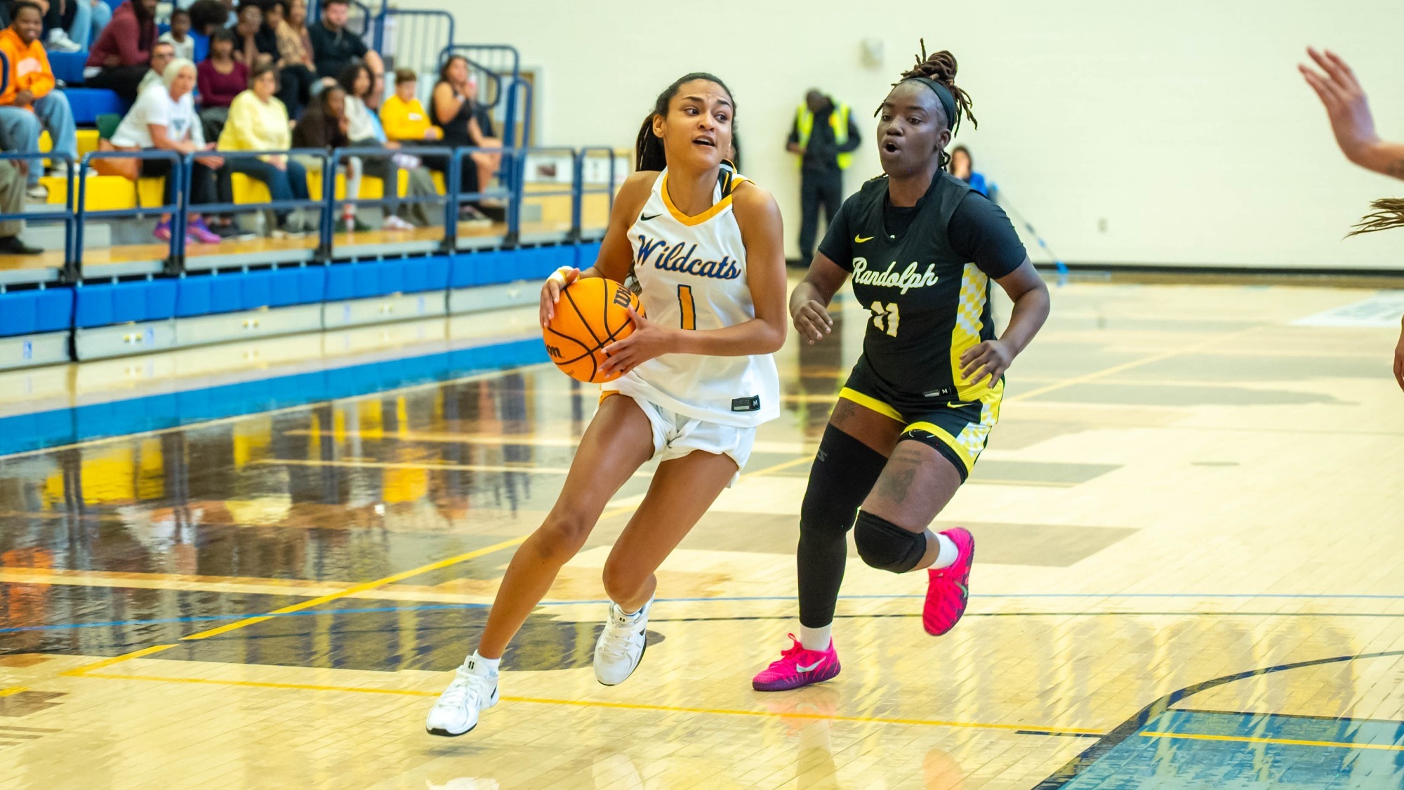 woman shooting a basketball