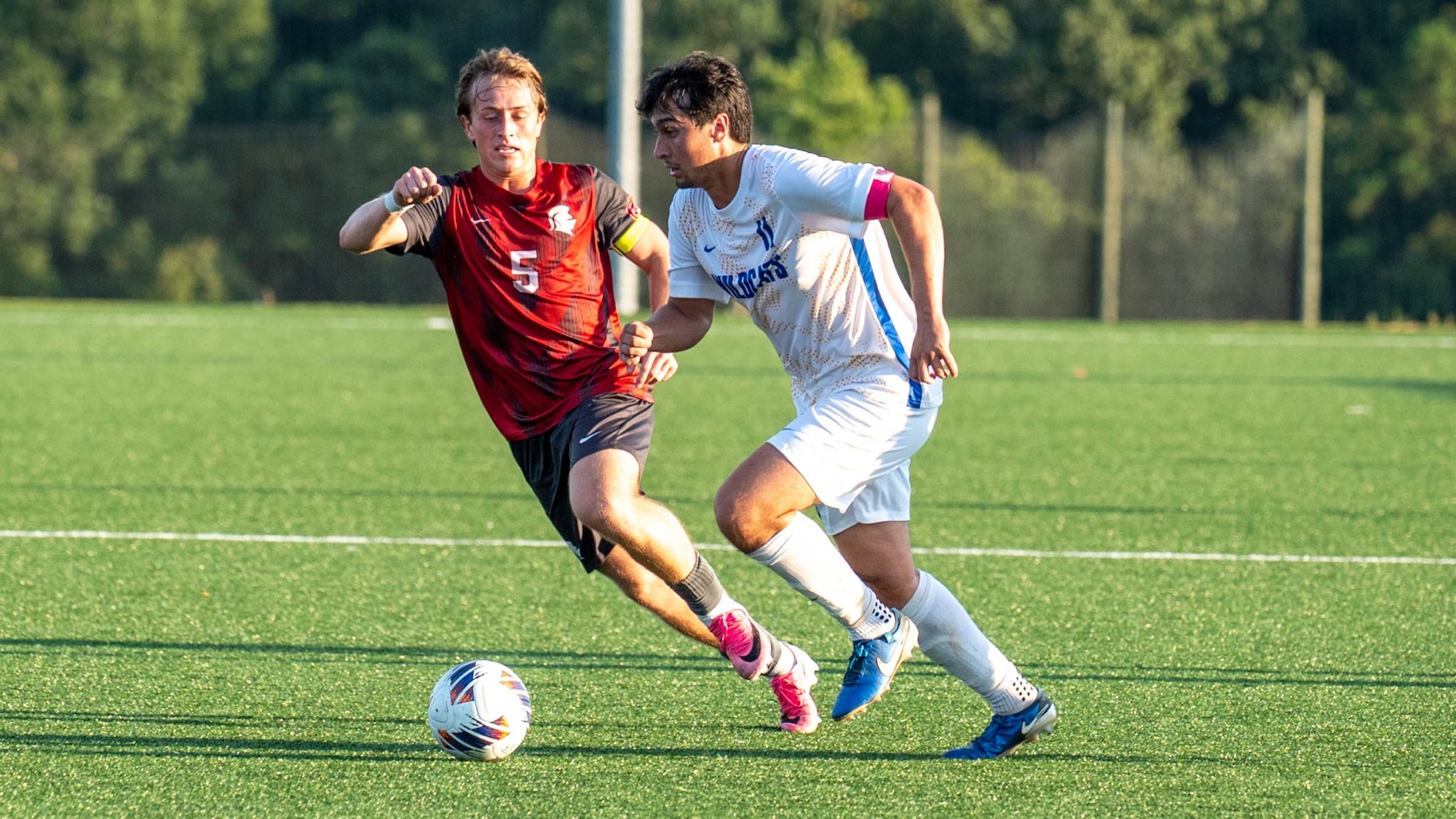 men playing soccer