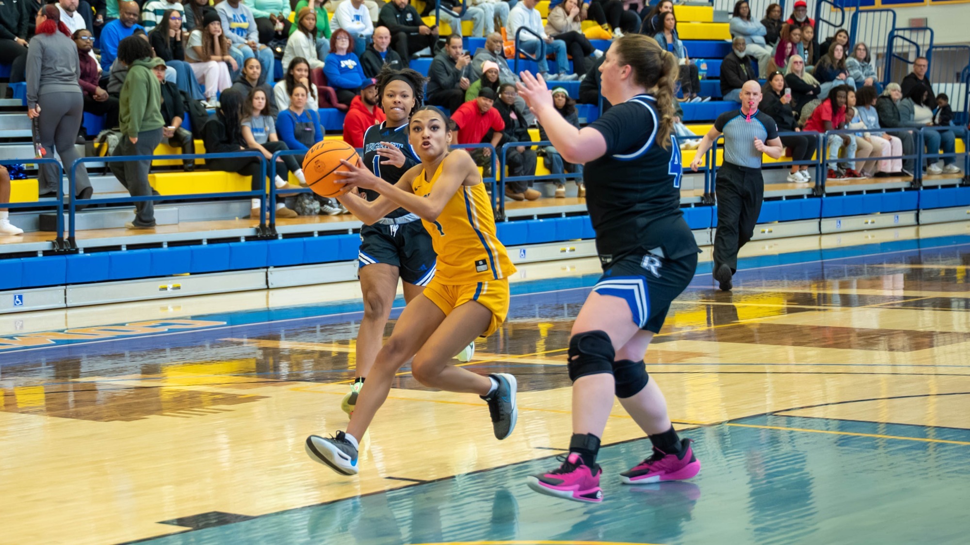 woman shooting a basketball