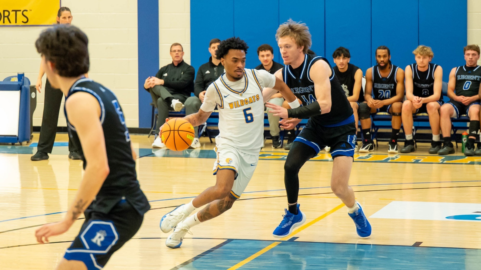 man dribbling a basketball