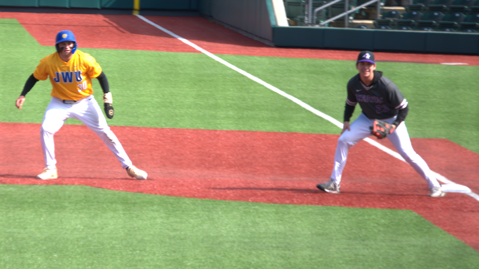 man running from first to second