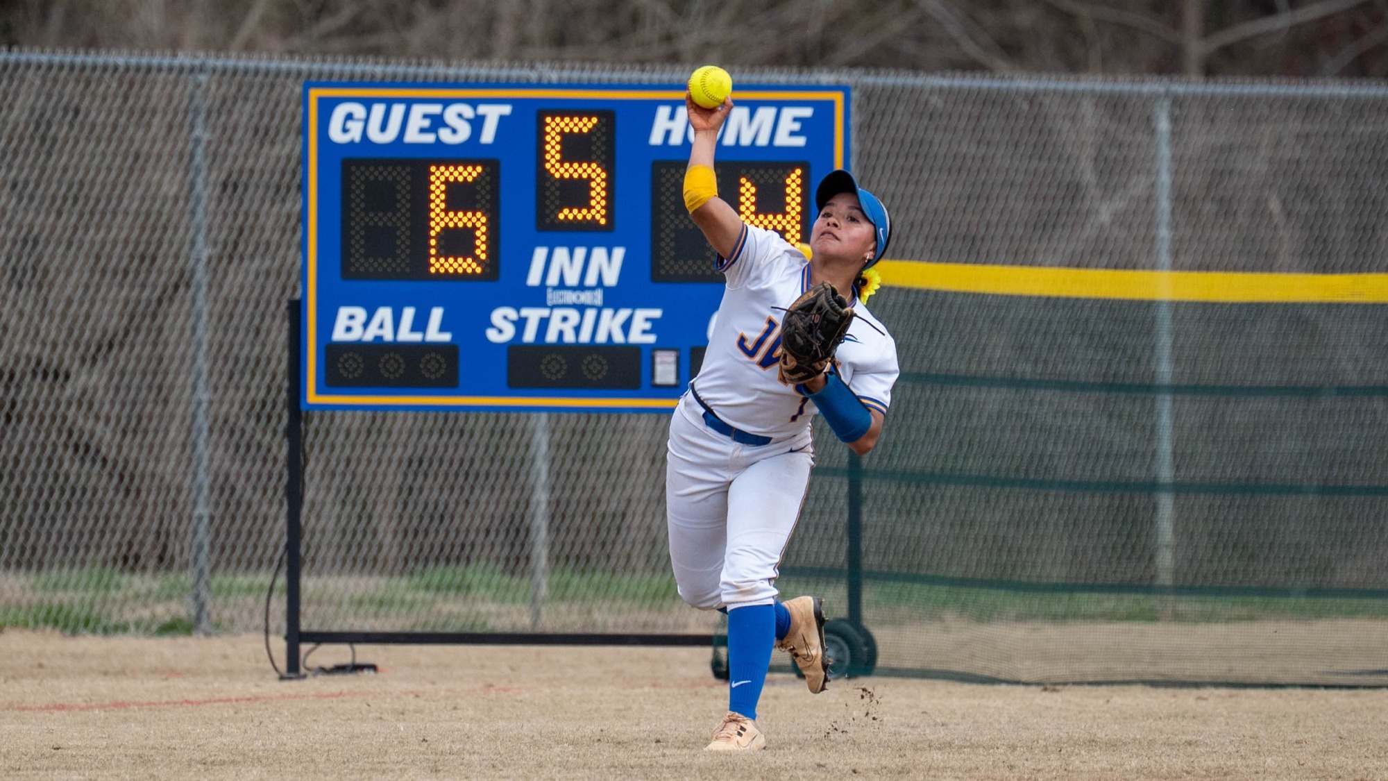 woman catching a softball