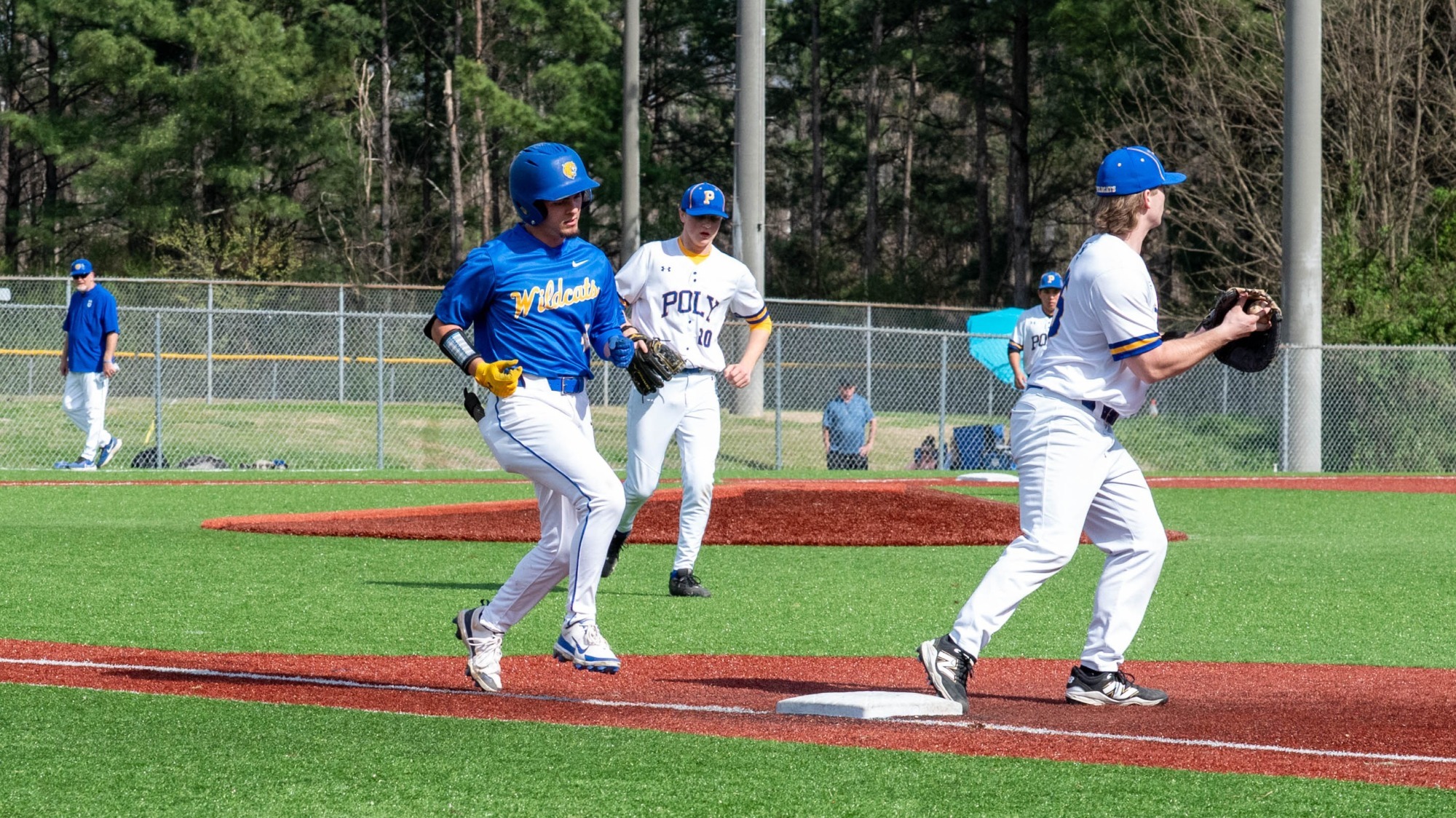 man running to first base
