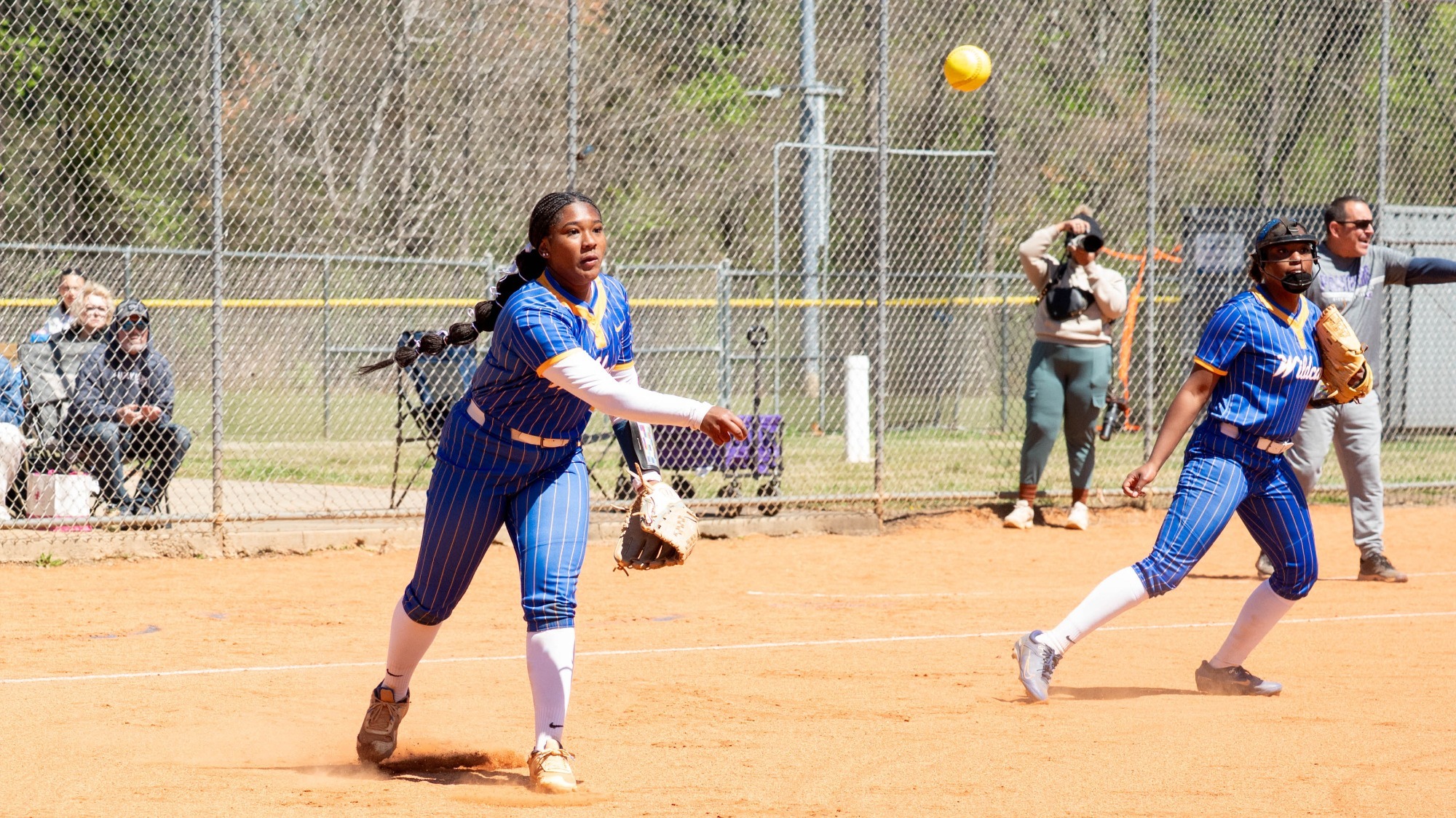woman throwing a softball
