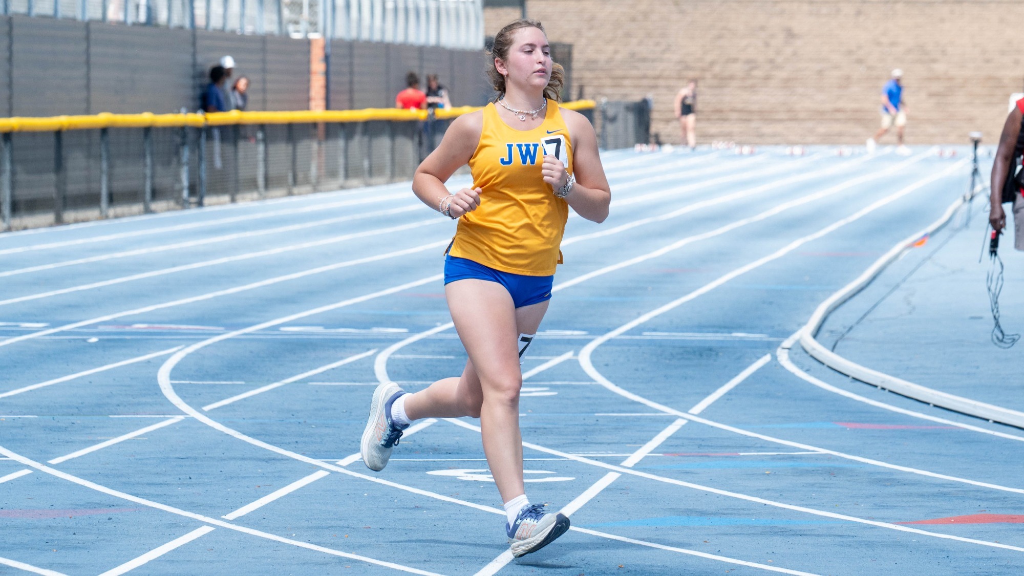 woman running on a track