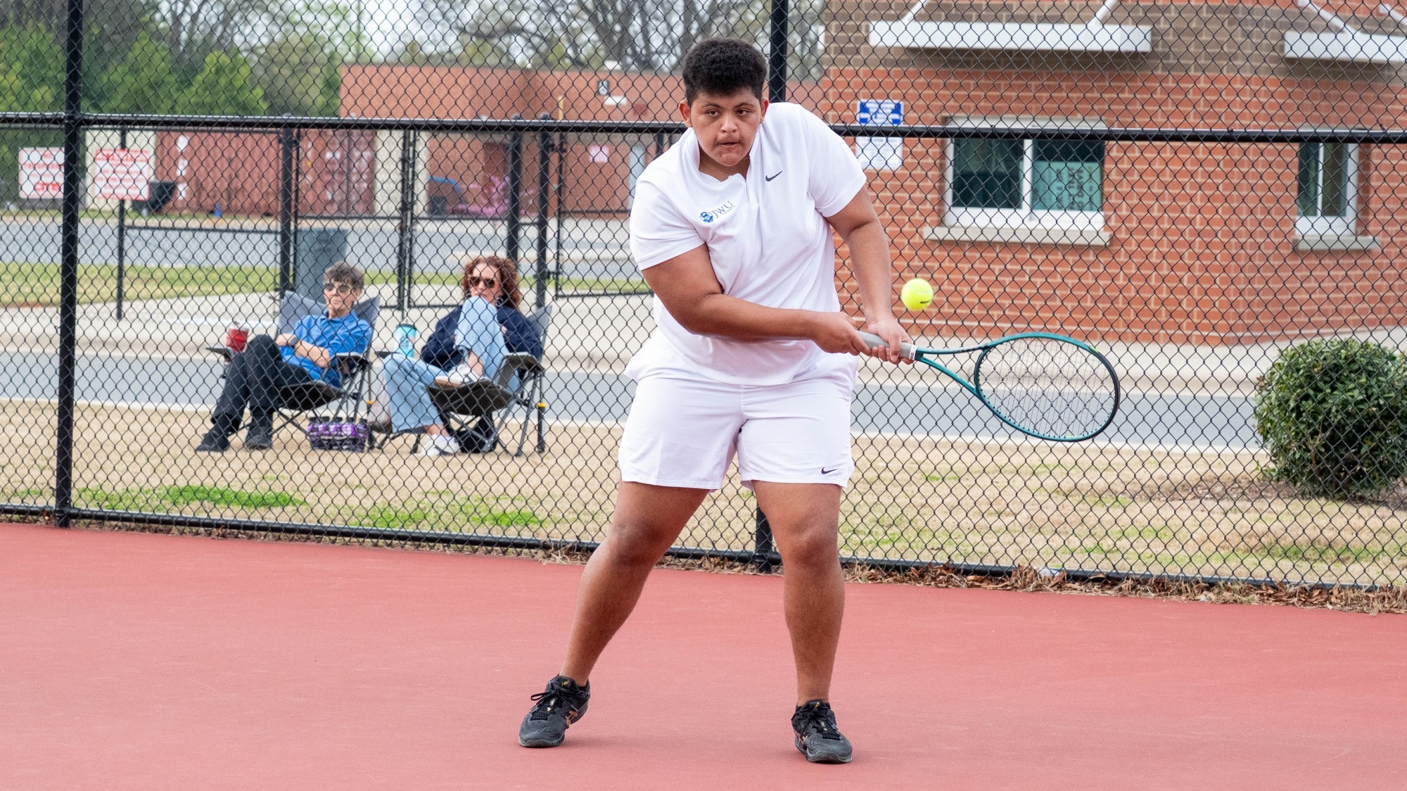 man playing tennis