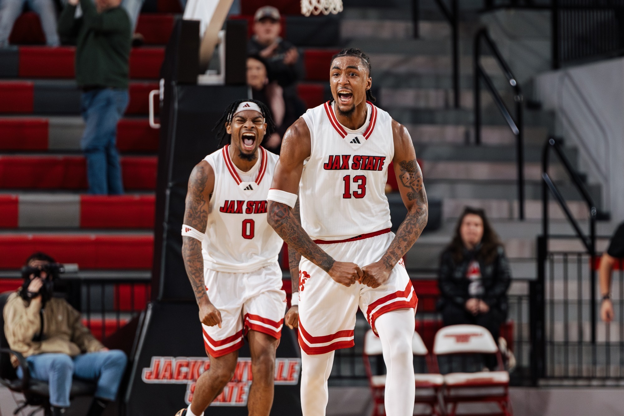 Emondrek Erkins-Ford and AC Bryant celebrating