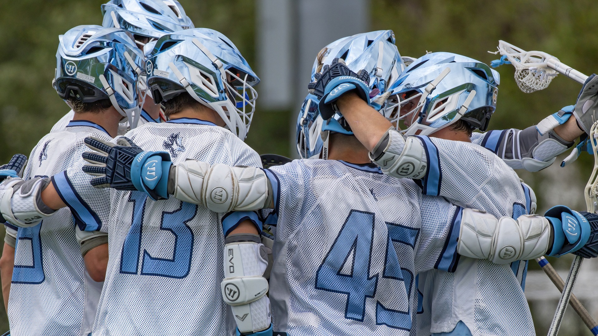 MLAX Victory huddle