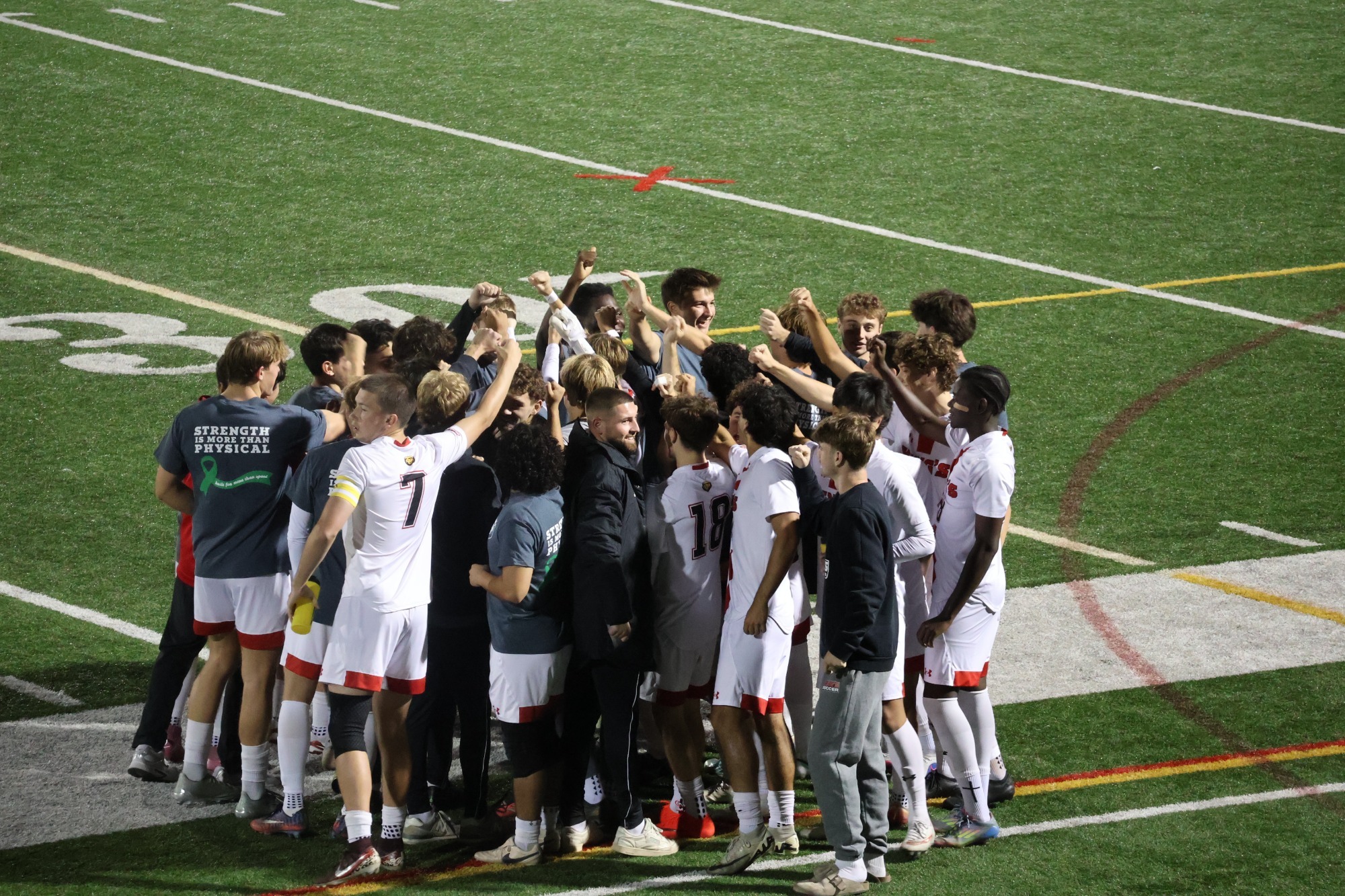 Jones and Villano in Huddle