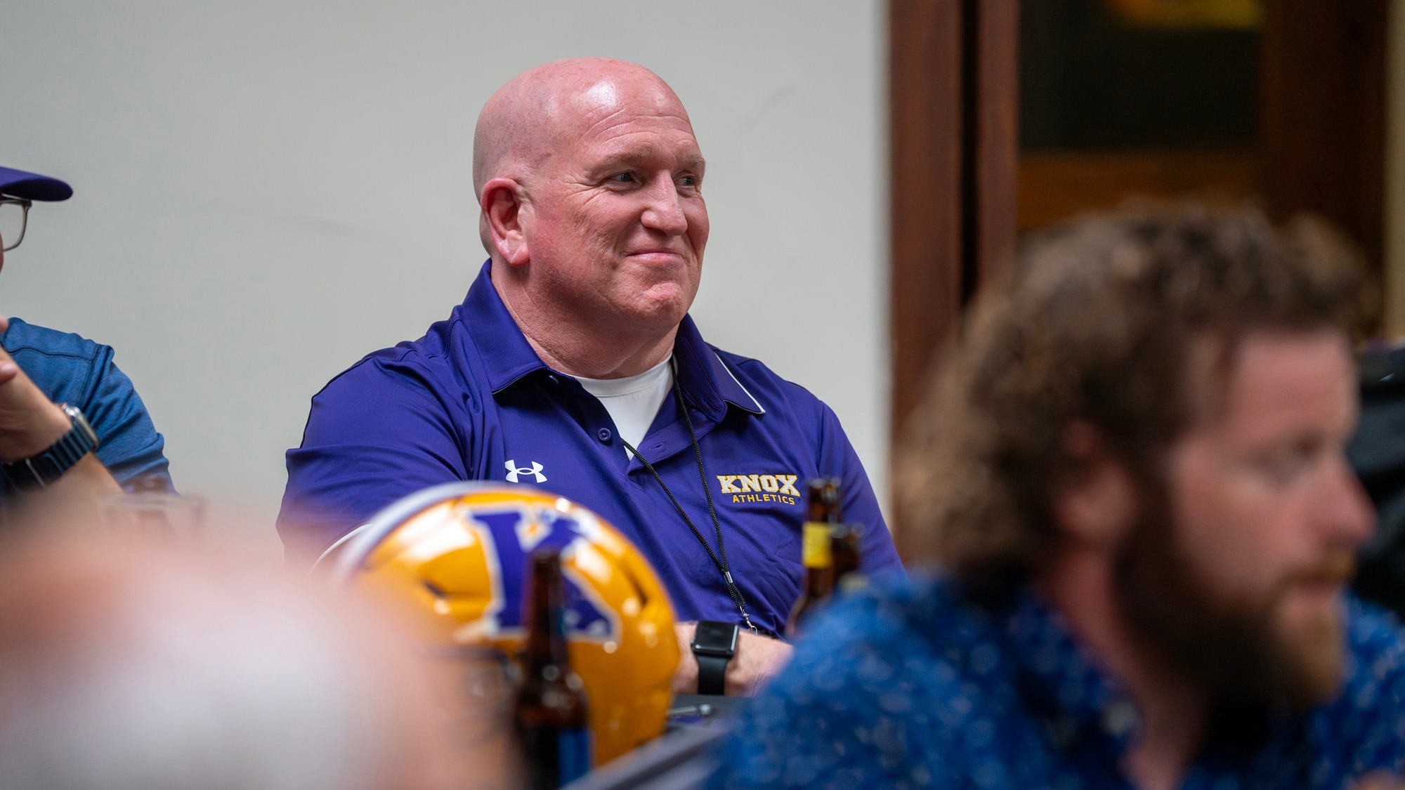 Andy Gibbons listens proudly at the 2025 Football Reunion.