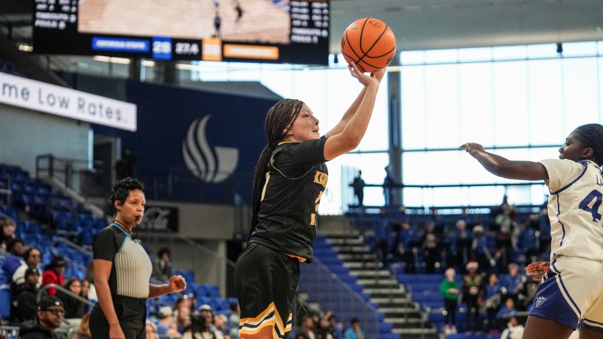 Kennesaw State guard Shania Nichols shoots a 3-pointer in the Owls' 69-63 win at Georgia State on December 14, 2025.